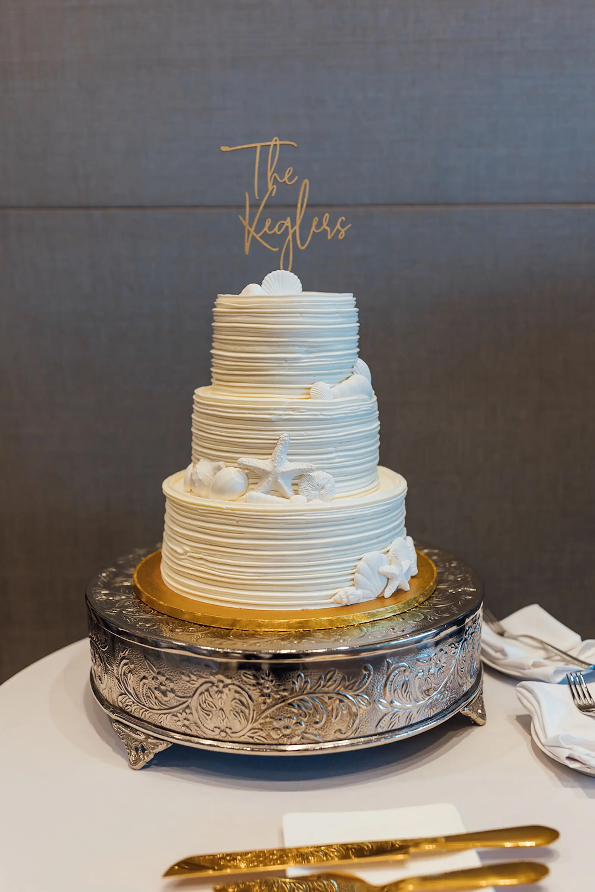 White Coastal Three-Tiered Round Wedding Cake Inspiration