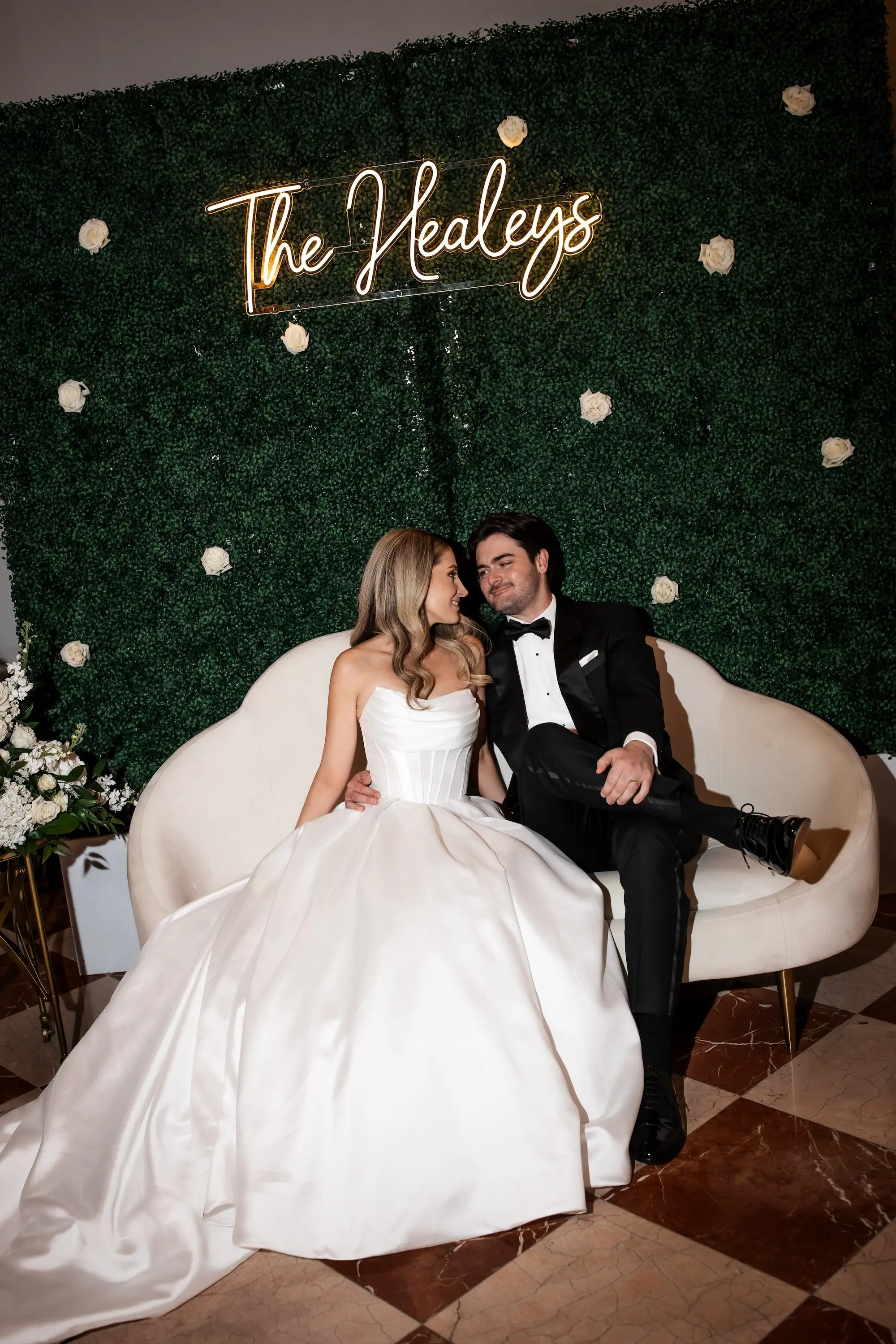 39Modern Black and White Wedding Inspiration - Timeless Black and White Downtown Tampa Wedding | The Vault Bride and Groom Wedding Reception Portrait | Neon Sign in Hedge Wall Decor Inspiration | Kate Ryan Event Rentals