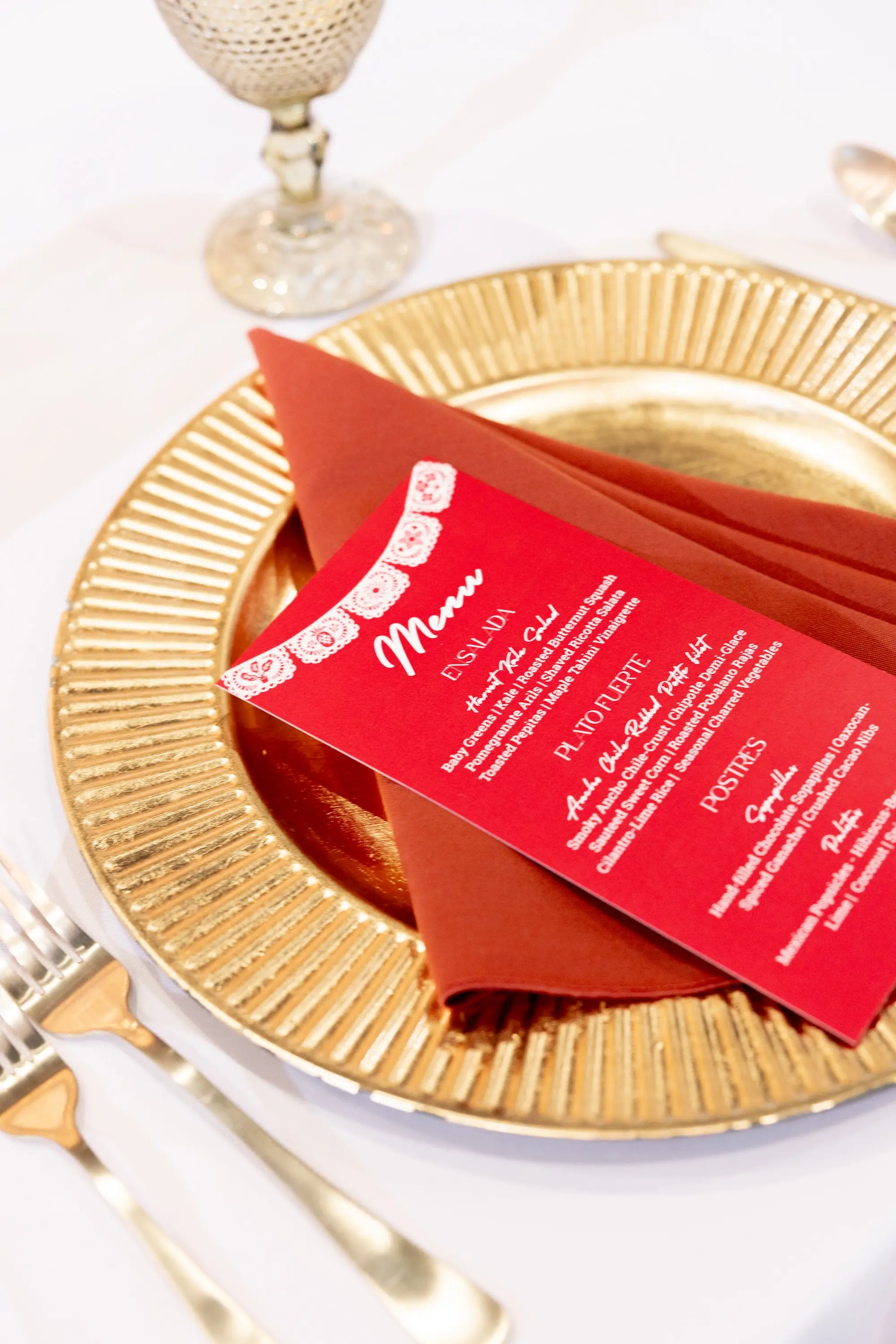 39Vibrant Southwestern Terracotta Pink and Orange Wedding Ideas - Vibrant, Rooftop Wedding Inspiration Shoot | Red Mesa Events Gold Charger on White Linen with Red Menu Card and Napkin with Gold Flatware Tablescape Decor Inspiration | St Pete Event Planner Coastal Coordinating
