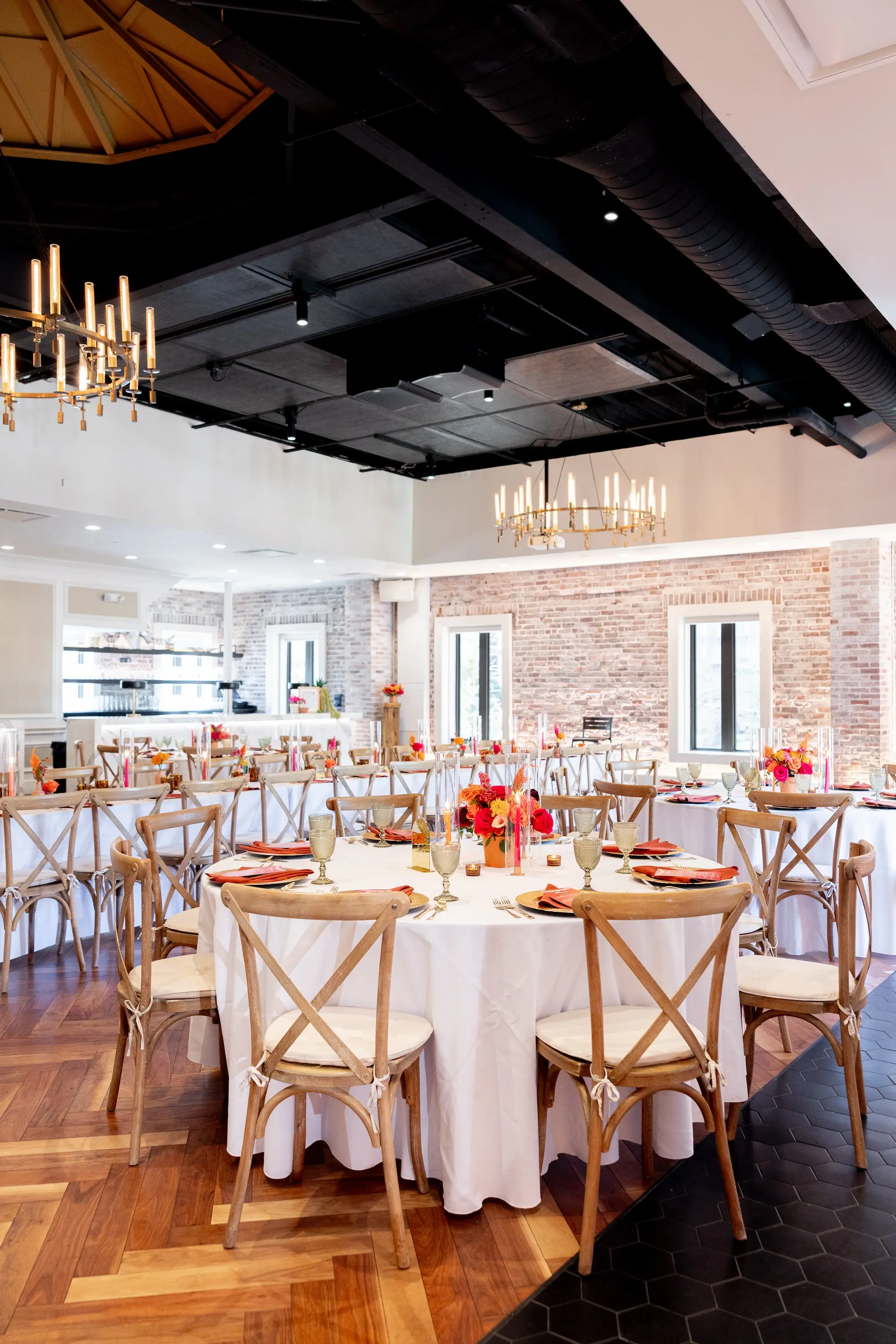 41Vibrant Southwestern Terracotta Pink and Orange Wedding Ideas St Pete Venue Red Mesa Events - Vibrant, Rooftop Wedding Inspiration Shoot | Red Mesa Events Southwestern Ballroom with Textured Brick Wall Wedding Reception | Rustic Wooden Chairs | Vibrant Southwest Mexican Wedding Reception Ideas | Bright Pink, Orange, Rust Red, Floral Arrangements Centerpiece Arrangements in Terracotta Pots Reception Decoration Inspiration | Tampa Bay Florist Save The Date Florida | St Pete Event Planner Coastal Coordinating | Downtown St Pete Event Venue Red Mesa Events | St Pete Rentals Gabro Event Services