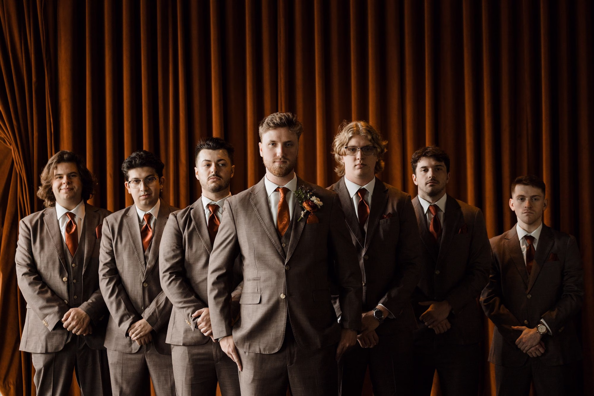 Groom with Groomsmen Wedding Portrait | Brown Linen Suit with Orange Terracotta Tie Groom Attire Inspiration | Tampa Bay Photographer Evoke Photo and Film