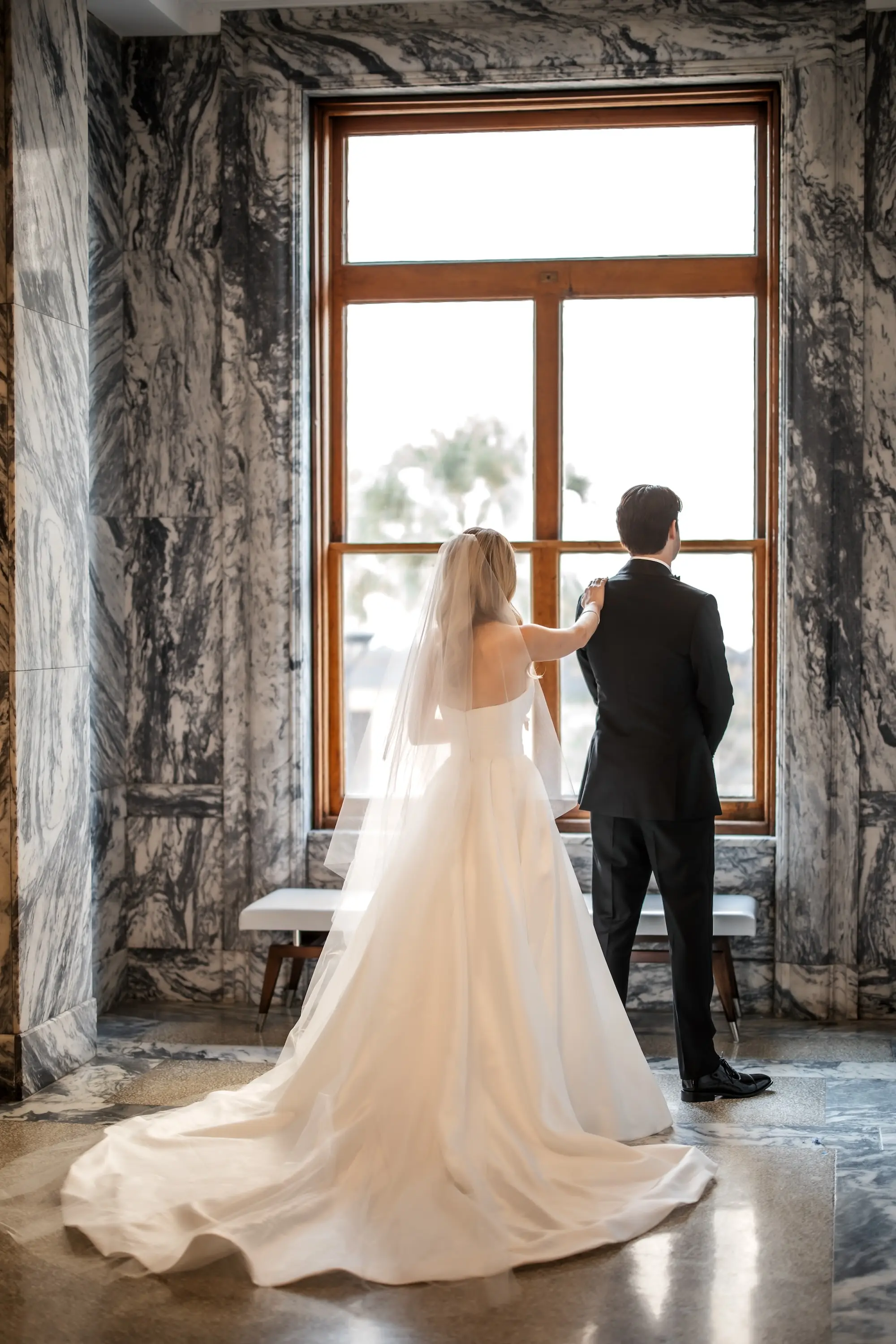 7Modern Black and White Wedding Inspiration - Timeless Black and White Downtown Tampa Wedding | The Vault Bride and Groom First Look Wedding Portrait | Wedding Venue The Vault