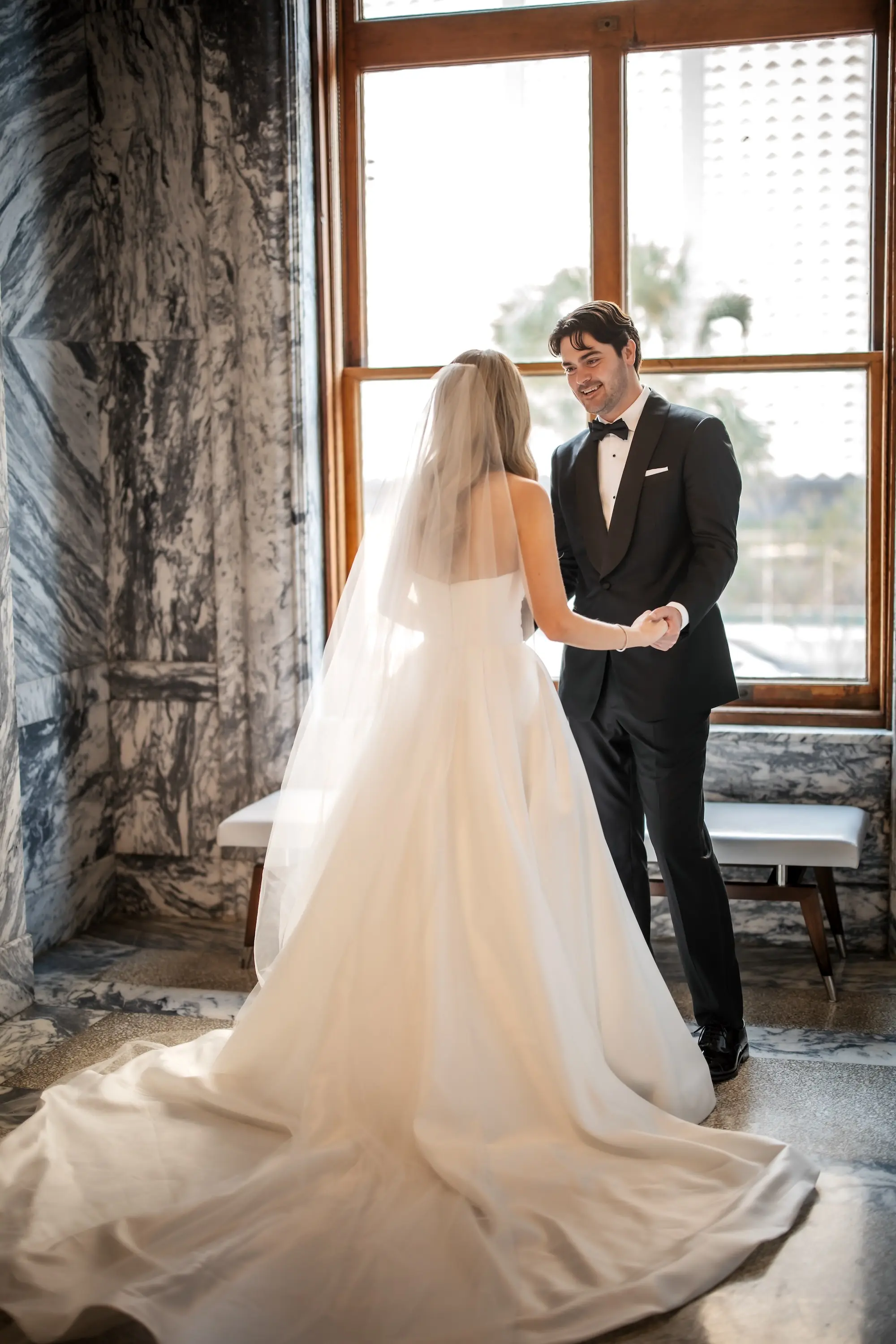 8Modern Black and White Wedding Inspiration - Timeless Black and White Downtown Tampa Wedding | The Vault Bride and Groom First Look Wedding Portrait | Wedding Venue The Vault