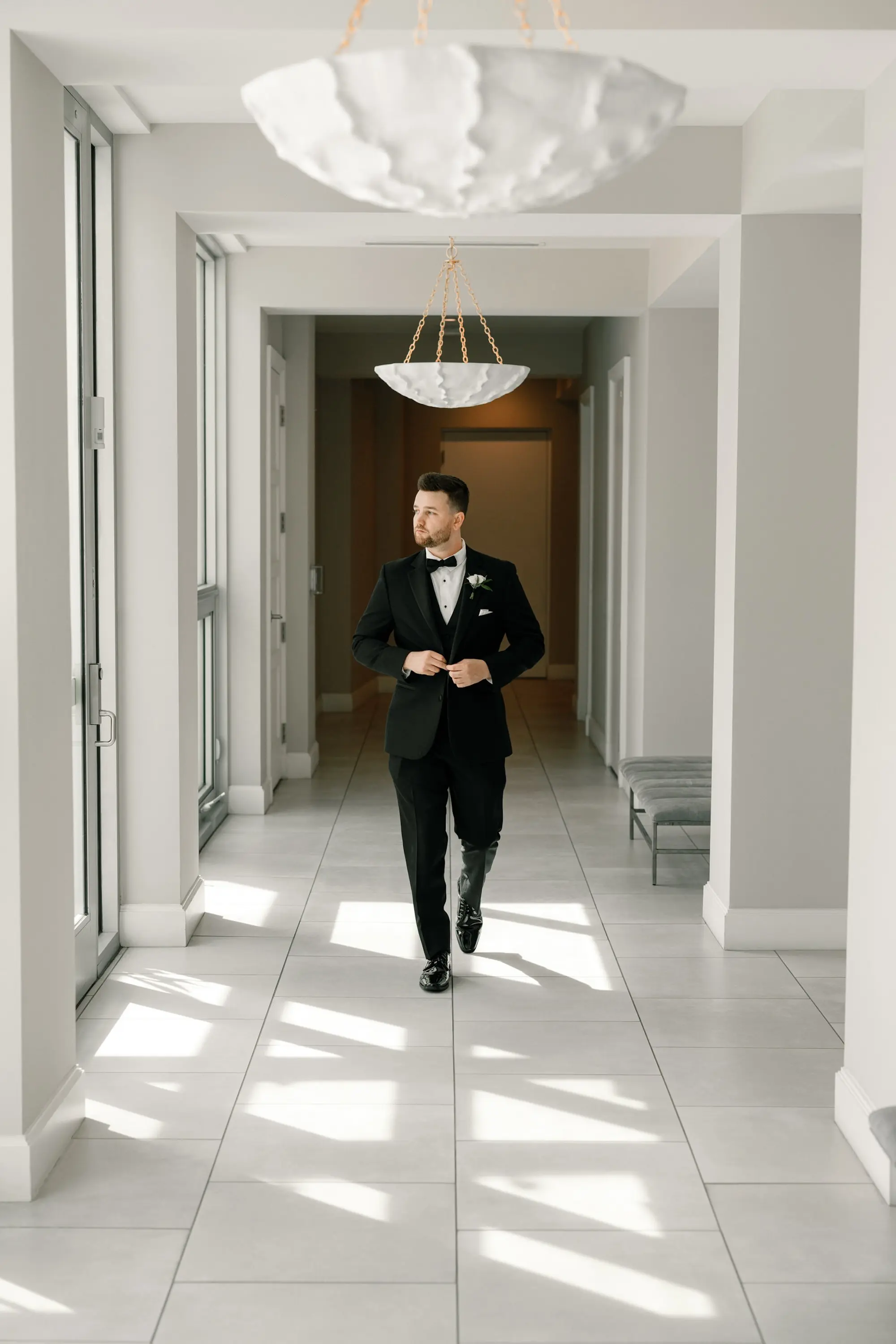 8Modern Classic Black and White Wedding Inspiration - Modern, Black and White Tampa Wedding | Hyde House Public Studio Groom in Black Three Piece Tuxedo Wedding Attire Ideas