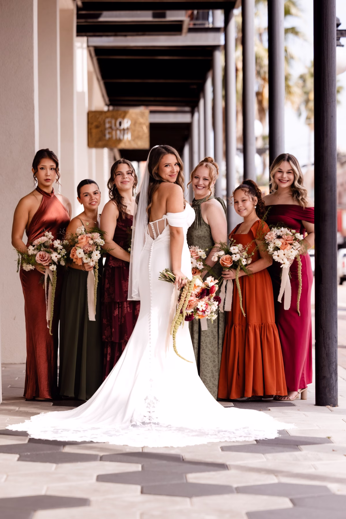 Bride and Bridesmaid Wedding Portrait | Fall Red, Orange and Green Mismatched Bridesmaid Dresses Inspiration | White Fitted Off the Shoulder Bearer of the Bling Wedding Gown Ideas | Tampa Bay Photographer Evoke Photo and Film