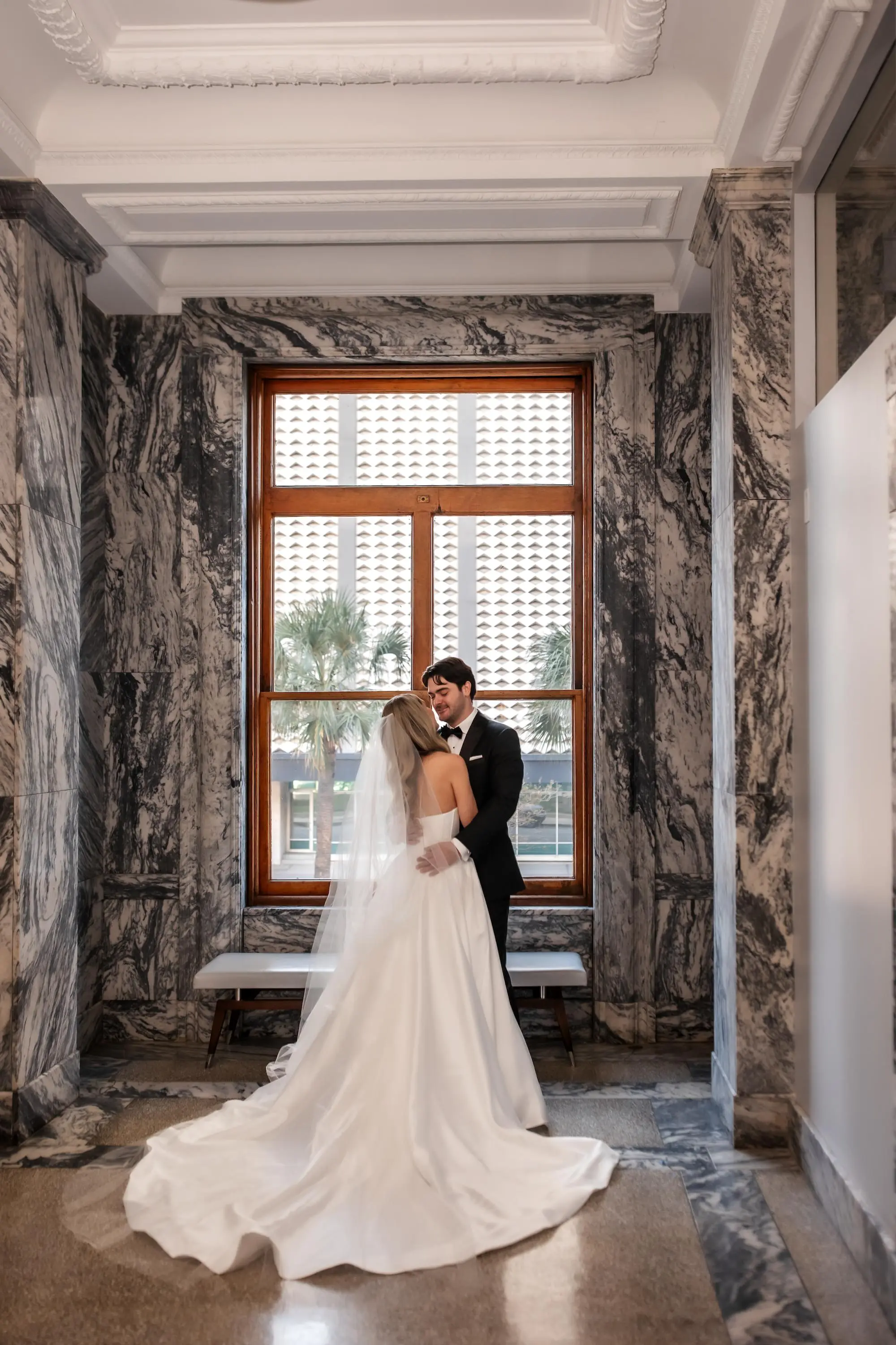 9Modern Black and White Wedding Inspiration - Timeless Black and White Downtown Tampa Wedding | The Vault Bride and Groom First Look Wedding Portrait | Wedding Venue The Vault