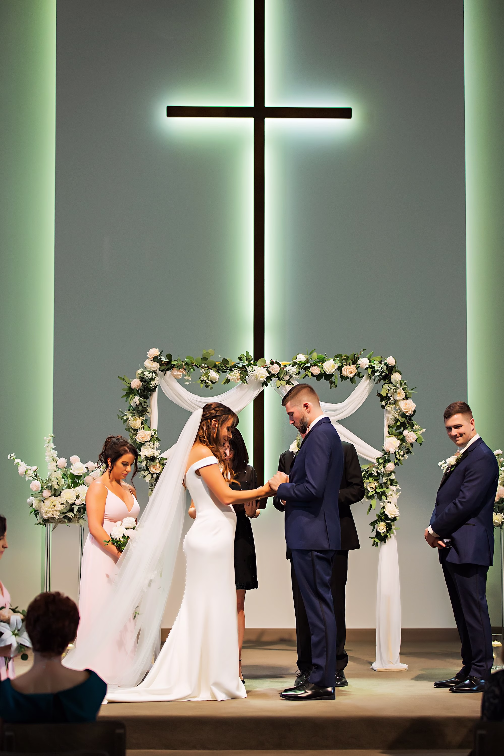 12Elegant Navy Blue and Blush PInk Wedding Ideas Tampa Venue First Pres Church - Elegant, Navy and Blush Downtown Tampa Wedding | The Vault Bride and Groom Wedding Ceremony Vow Exchange Wedding Portrait | White A-Line Stella Grace Wedding Gown with Traditional Tulle Veil Bridal Inspiration | White and Blush Roses Floral Square Altar Arch with White Draping Wedding Ceremony Decor Ideas | Downtown Tampa Wedding Ceremony Church Venue First Presbyterian Tampa | Tampa Bay Photographer Limelight Photography