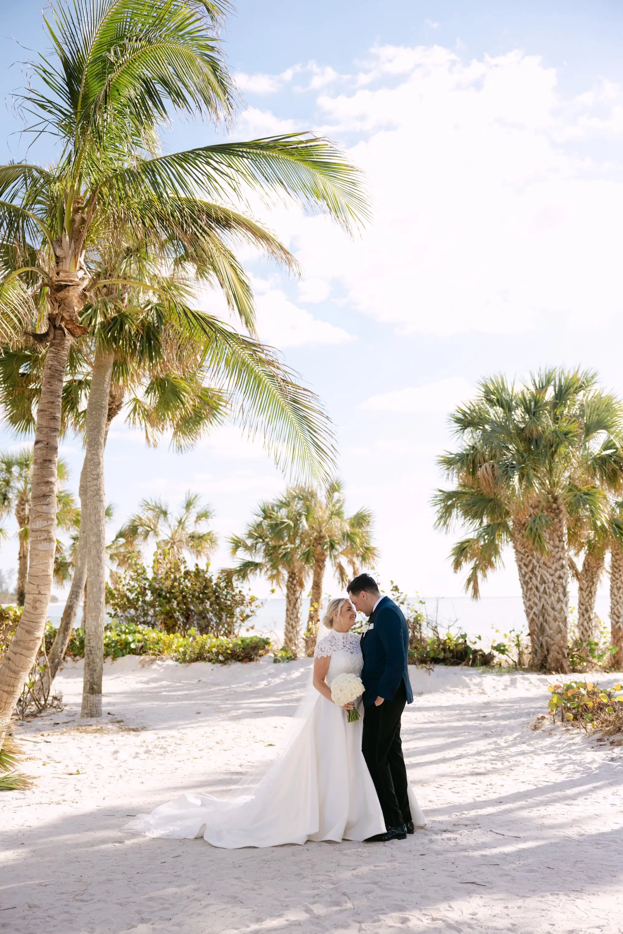 15Tropical Red and Orange Outdoor Florida Destination Wedding Venue Resort and Longoboat Key Club - Tropical Outdoor Sarasota Wedding | The Resort at Longboat Key Club Bride and Groom Wedding Portrait | Sarasota Event Venue The Resort at Longboat Key Club