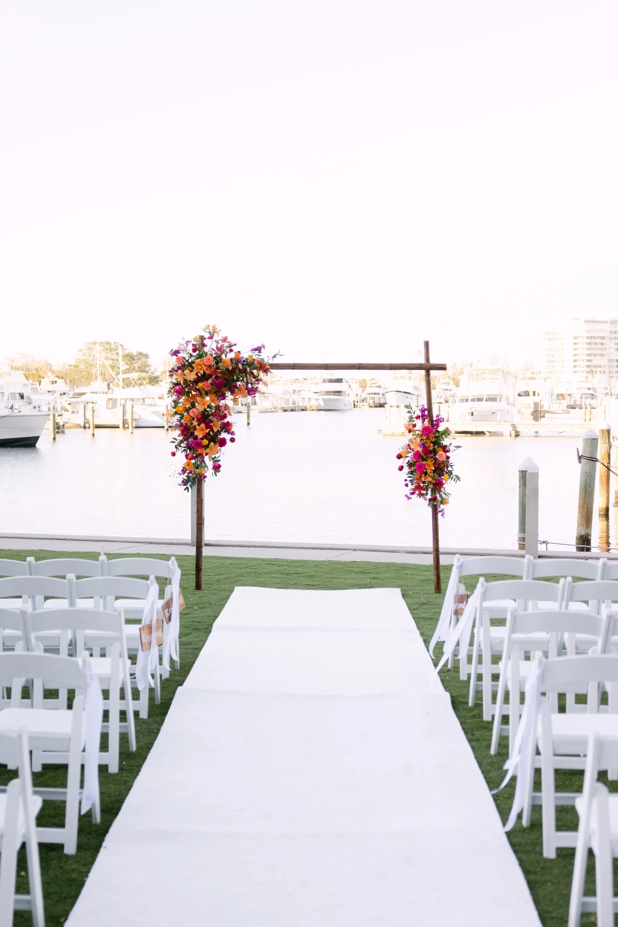 19Tropical Red and Orange Outdoor Florida Destination Wedding - Tropical Outdoor Sarasota Wedding | The Resort at Longboat Key Club Tropical Red and Orange Outdoor Waterfront Wedding Ceremony Decor Ideas