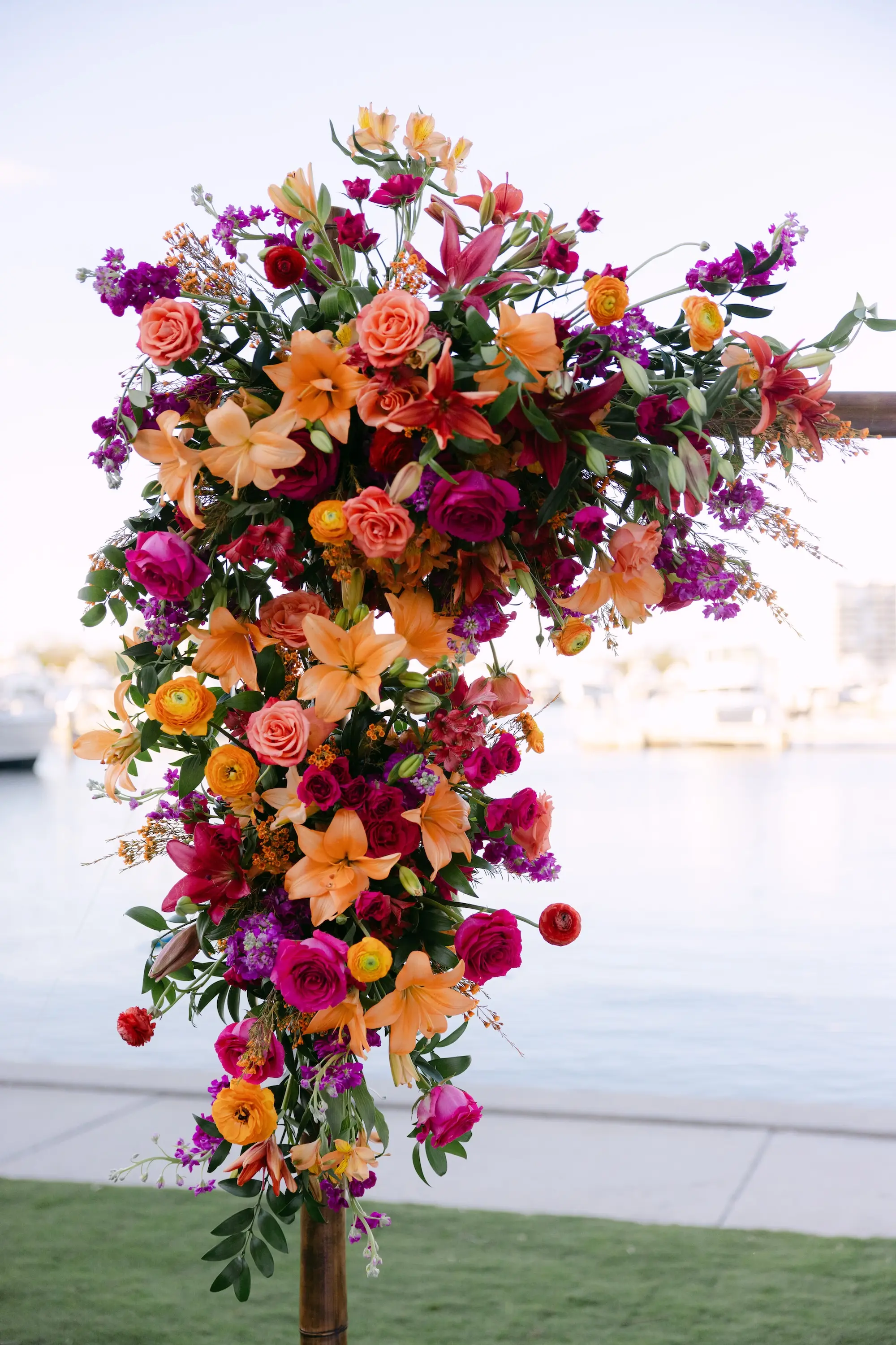 21Tropical Red and Orange Outdoor Florida Destination Wedding - Tropical Outdoor Sarasota Wedding | The Resort at Longboat Key Club Tropical Red and Orange Outdoor Waterfront Wedding Ceremony Arch Floral Decor Ideas