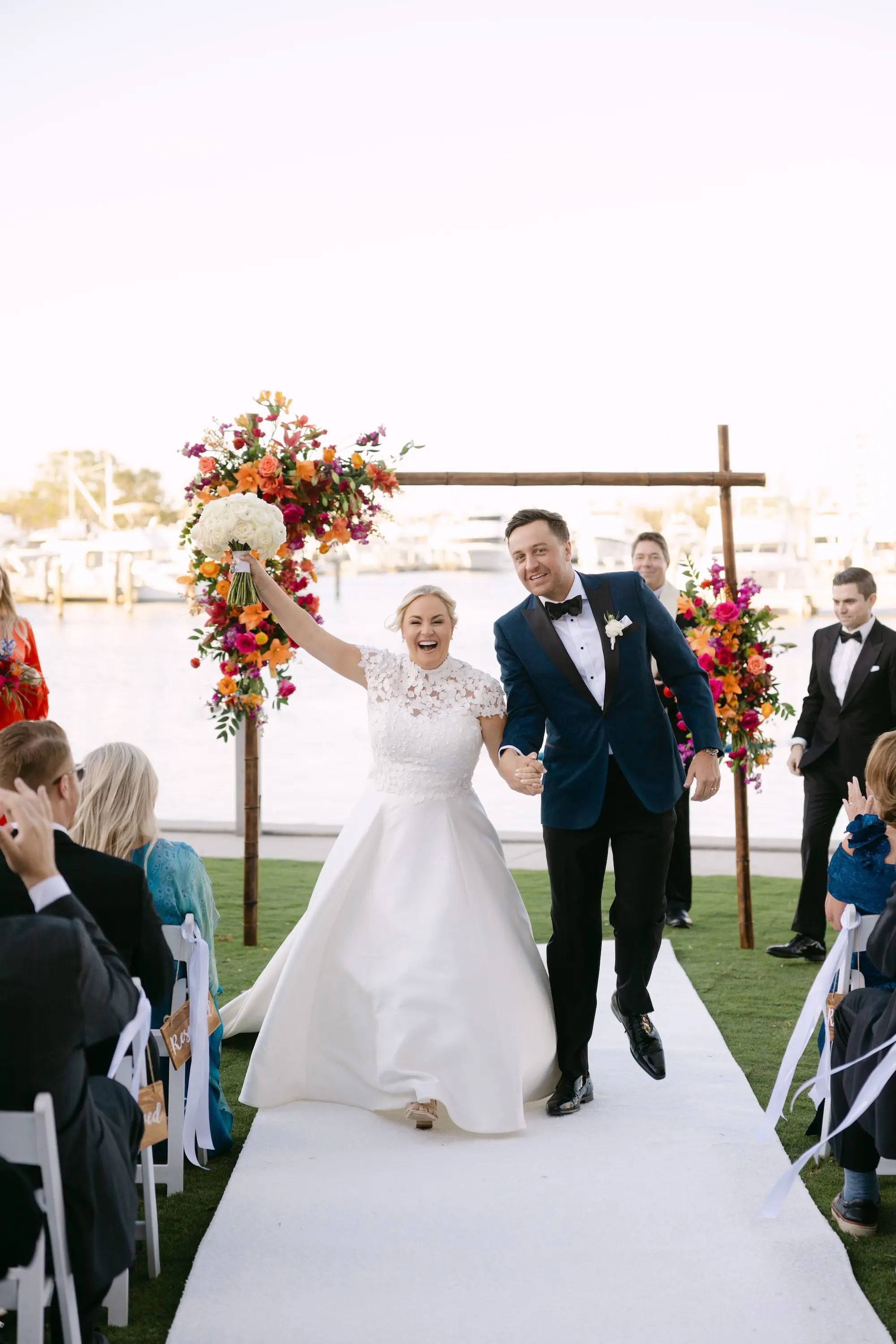 29Tropical Red and Orange Outdoor Florida Destination Wedding - Tropical Outdoor Sarasota Wedding | The Resort at Longboat Key Club Bride and Groom Just Married Wedding Portrait