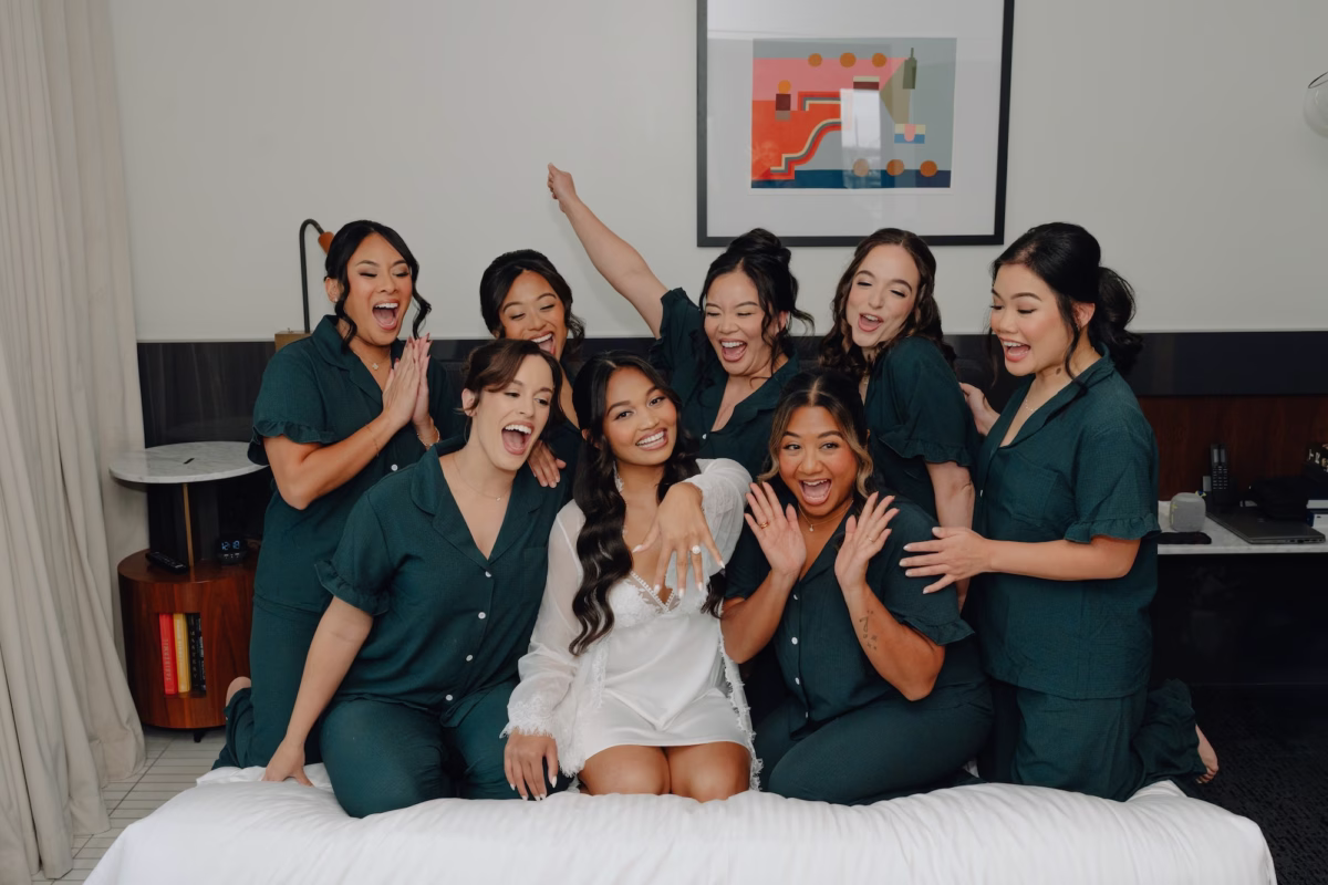 Bride and Bridesmaids Getting Ready Wedding Portrait in Matching Satin Emerald Green Pajama Sets Inspiration | Tampa Bay Photographer and Videographer J&S Media Wedding Films & Photo