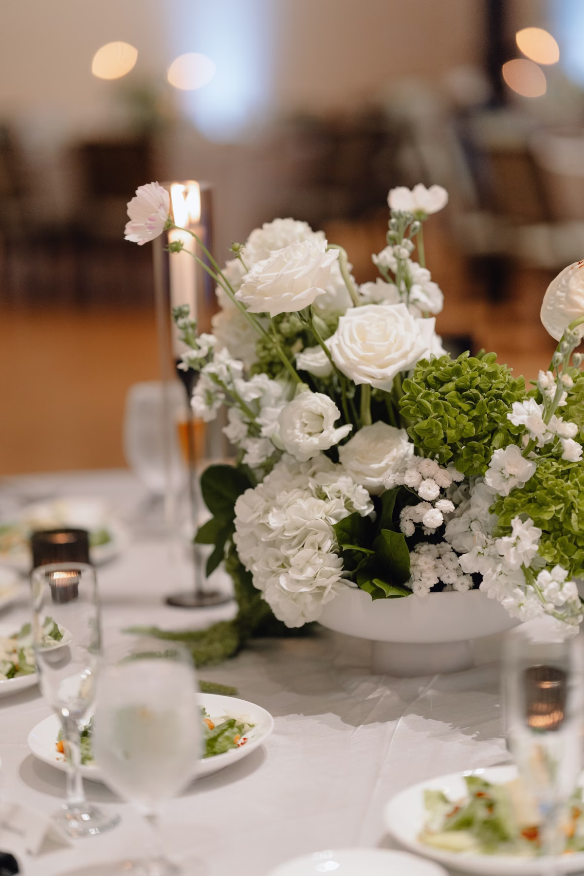 Elegant Botanical Black and White Industrial Wedding Reception Decor Ideas | Modern Florals with White Roses, Hydrangeas, Tropical Anthurium and Lush Greenery Wedding Reception Centerpieces Inspiration | Ybor Planner The Olive Tree Weddings