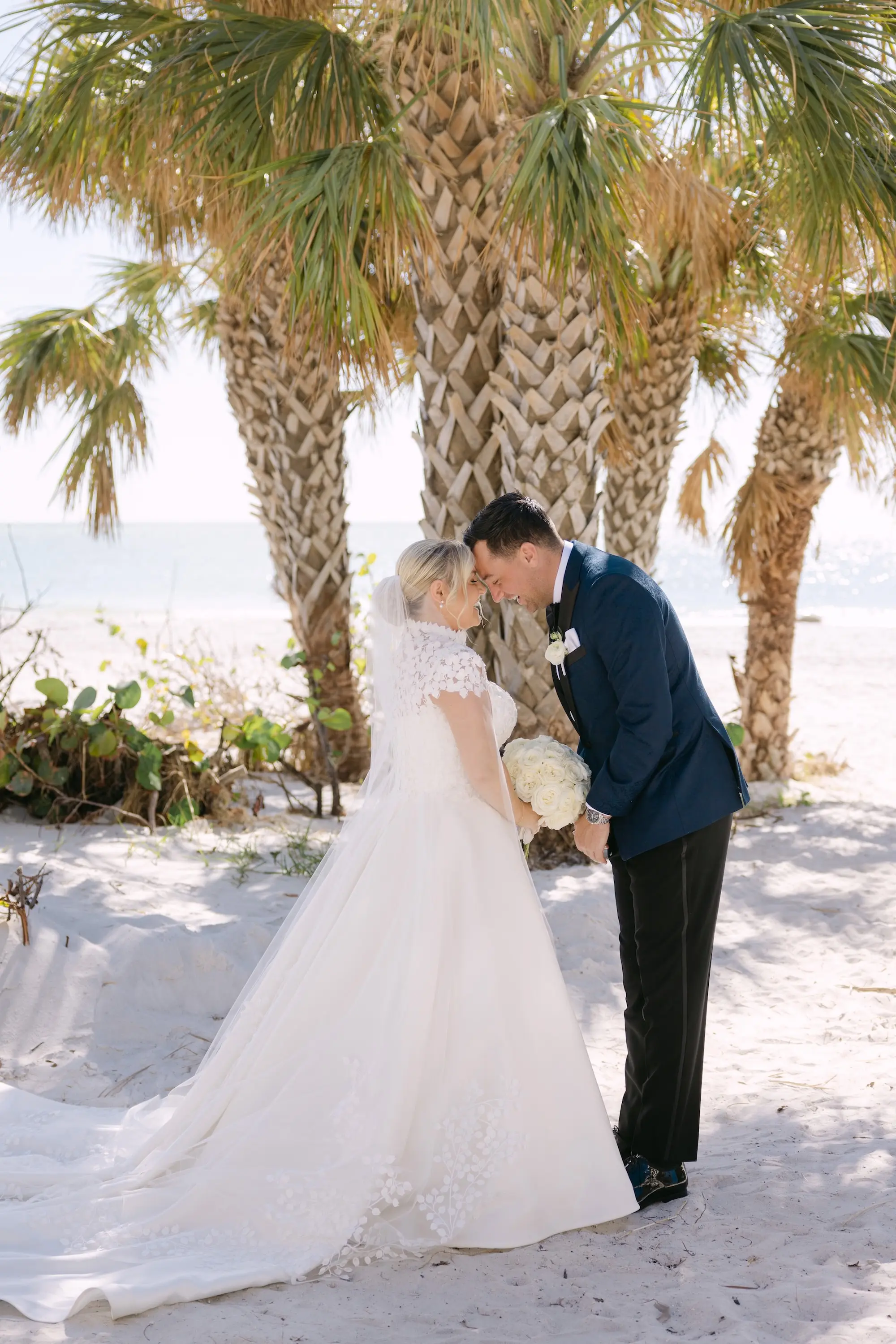 9Tropical Red and Orange Outdoor Florida Destination Wedding - Tropical Outdoor Sarasota Wedding | The Resort at Longboat Key Club Bride and Groom First Look Private Vow Wedding Portrait