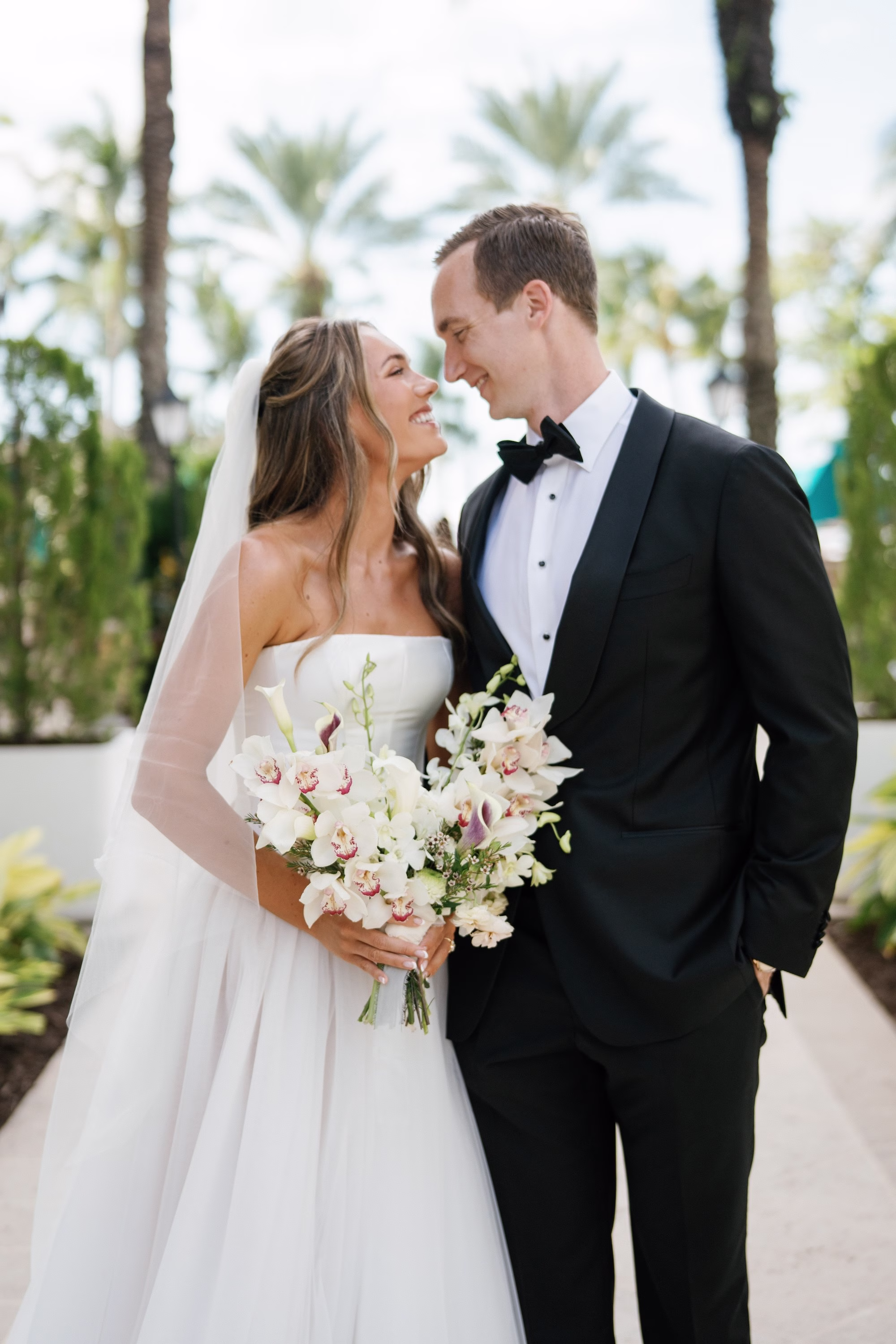 11Elegant Florida Garden Party Wedding Inspiration - Luxurious Garden Destination Wedding | Ritz-Carlton, Sarasota Bride and Groom Wedding Portrait | White Orchid Bridal Bouquet Inspiration | White Strapless Muse by Berta Wedding Gown Ideas
