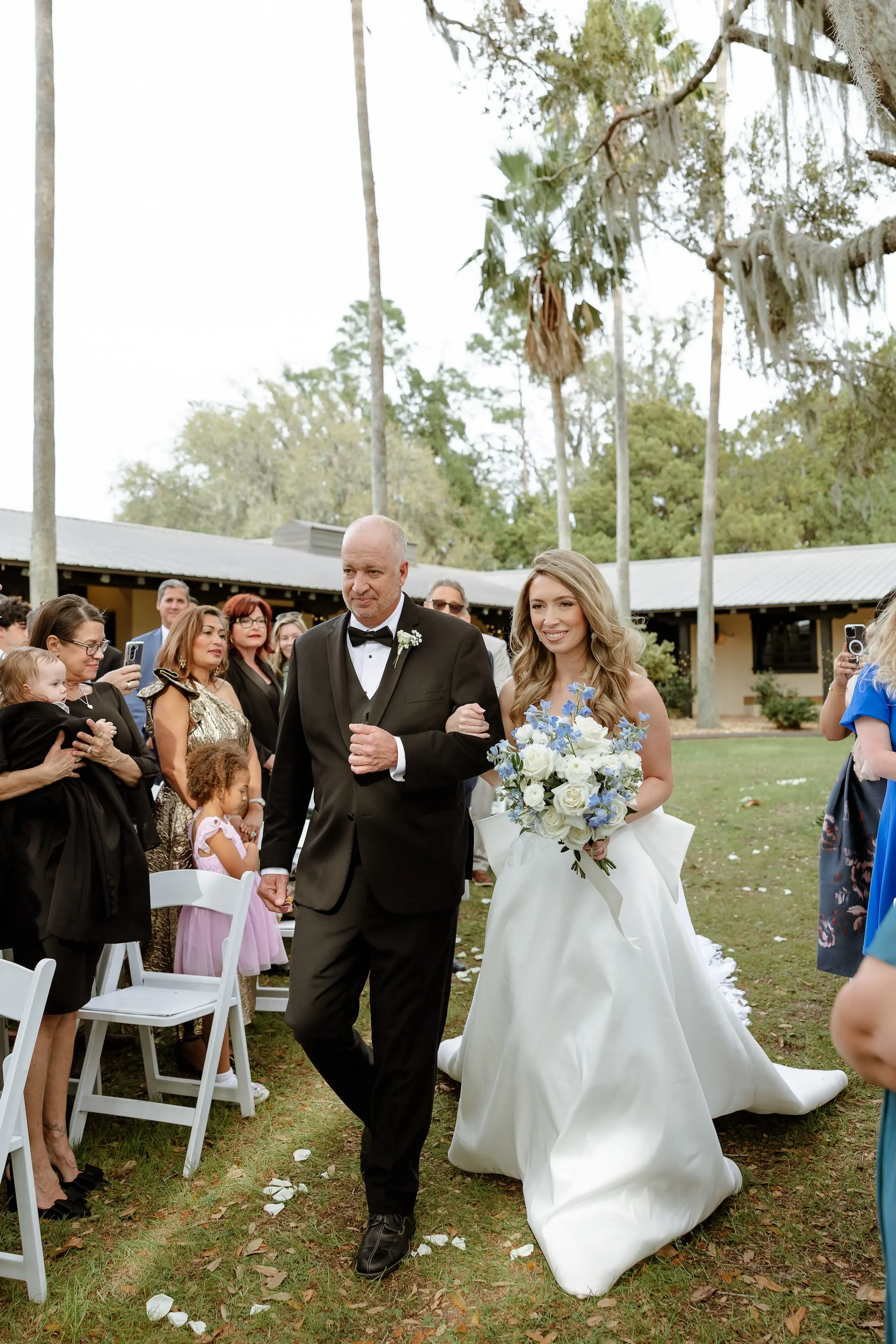 13Classic LIght Blue Florida Wedding Ideas - Classic White and Light Blue Brooksville Wedding | La Hacienda on Snow Hill Bride and Father Walking Down Wedding Aisle