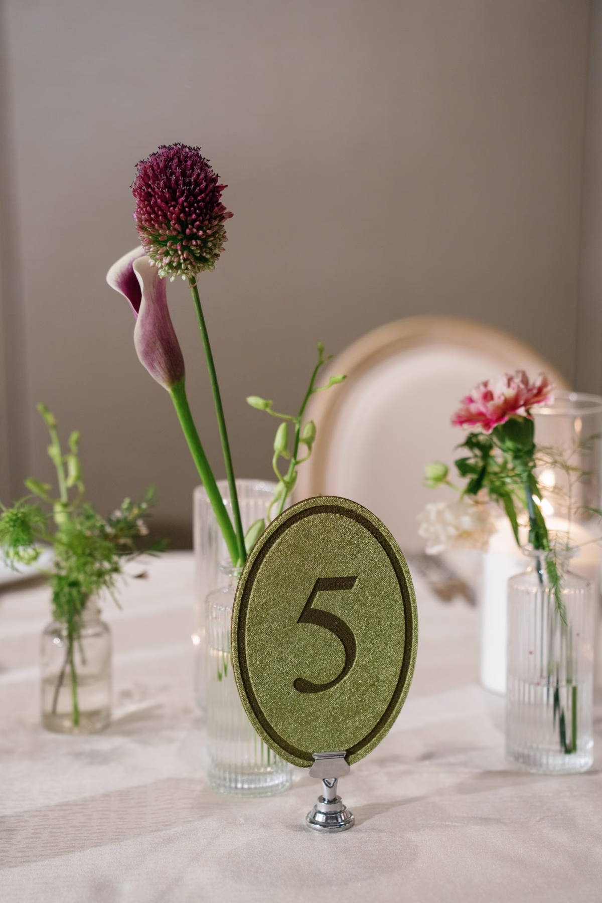 32Elegant Florida Garden Party Wedding Inspiration - Luxurious Garden Destination Wedding | Ritz-Carlton, Sarasota Organic Green and Neutrals Wedding Reception Decor Inspiration | Olive Green Velvet Table Number Wedding Reception Tablescape Decor Ideas | Delicate Purple Florals in Bud Vases Centerpiece Inspiration | Tampa Bay Planner MDP Events