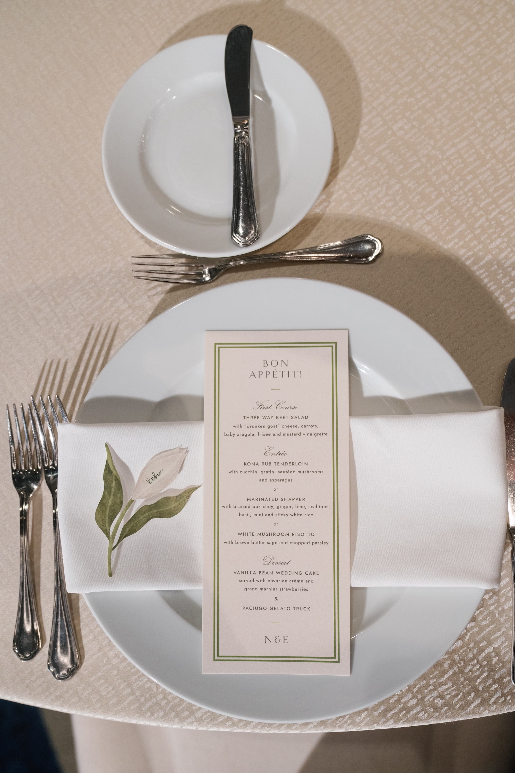 35Elegant Florida Garden Party Wedding Inspiration - Luxurious Garden Destination Wedding | Ritz-Carlton, Sarasota Romantic Neutral Organic White and Green Wedding Reception Decor Inspiration | Tan Linen with White Plate with White Linen Napkin with White and Green Personalized Calla Lily and White and Green Menu Tablescape Decor Ideas | Tampa Bay Planner MDP Events