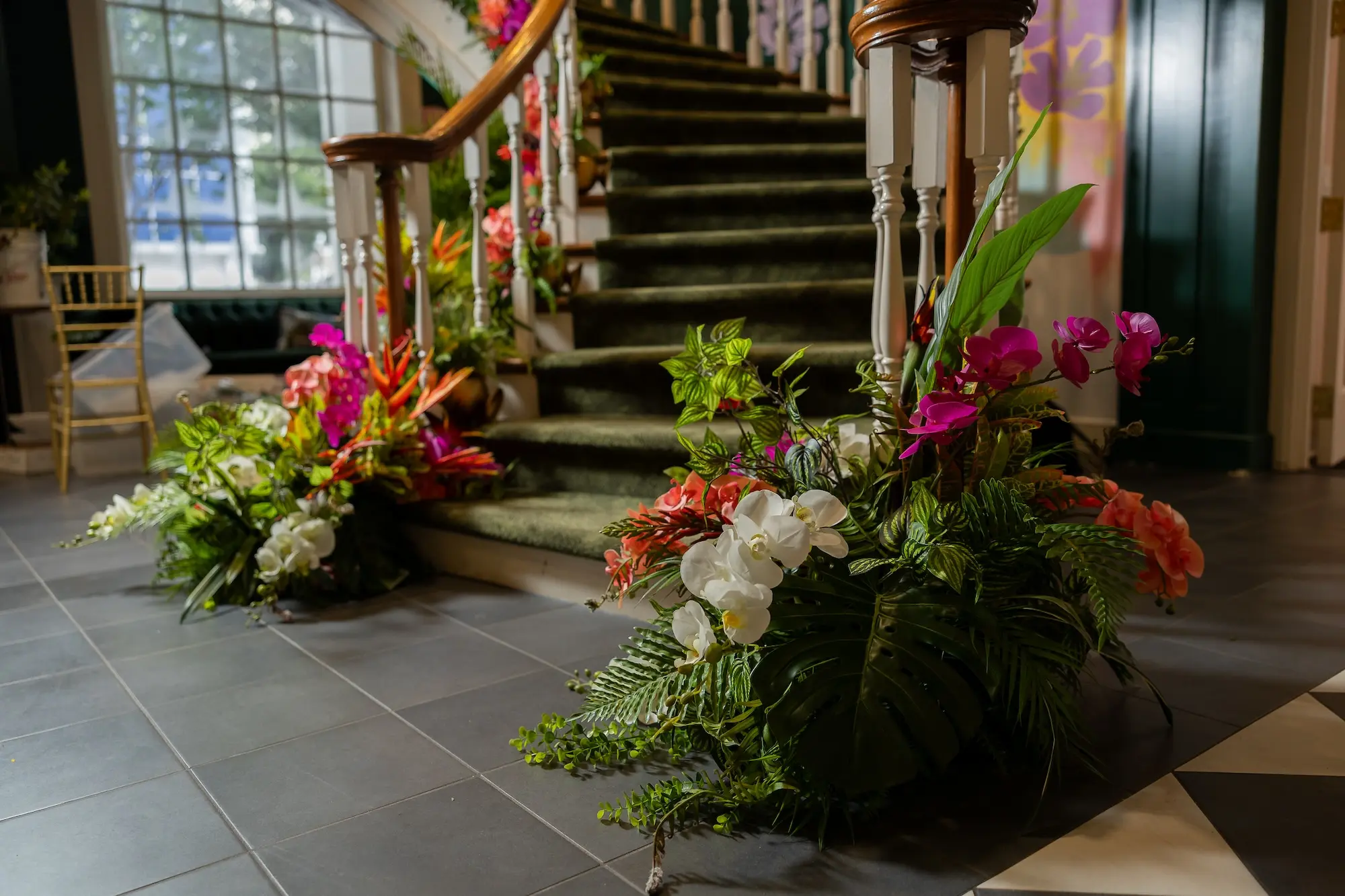 White Orchids with Vibrant Pink, Mauve, Orange Tropical Florals and Palm Greenery Wedding Reception Arrangements Decor Inspiration | Tampa Bay Wedding Venue The Spiral Staircase |