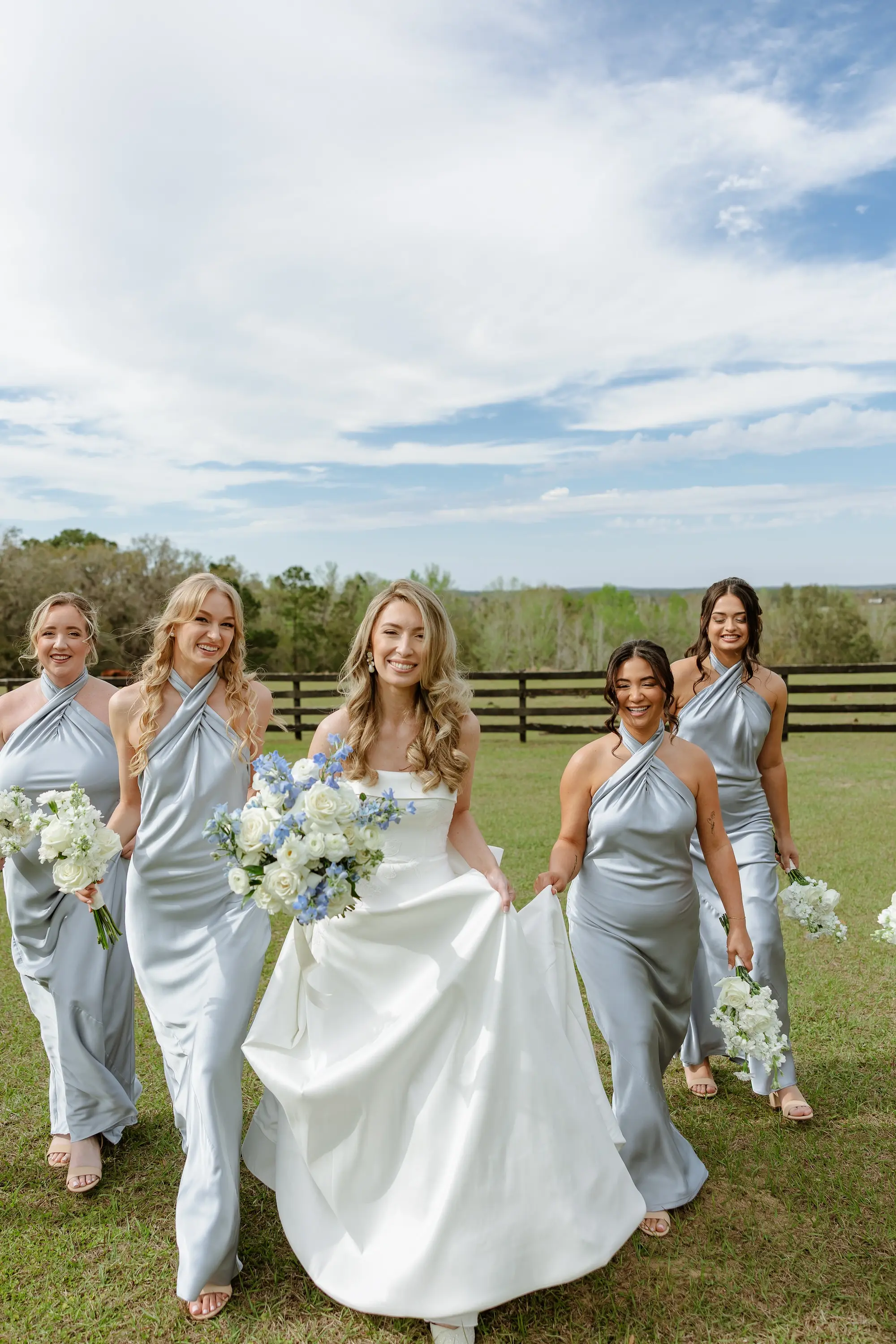 6Classic LIght Blue Florida Wedding Ideas - Classic White and Light Blue Brooksville Wedding | La Hacienda on Snow Hill Bride and Bridesmaids Wedding Portrait | Matching Satin Blue Bridesmaids Dress Inspiration | Tampa Bay Hair and Makeup Artist Femme Akoi Beauty Studio