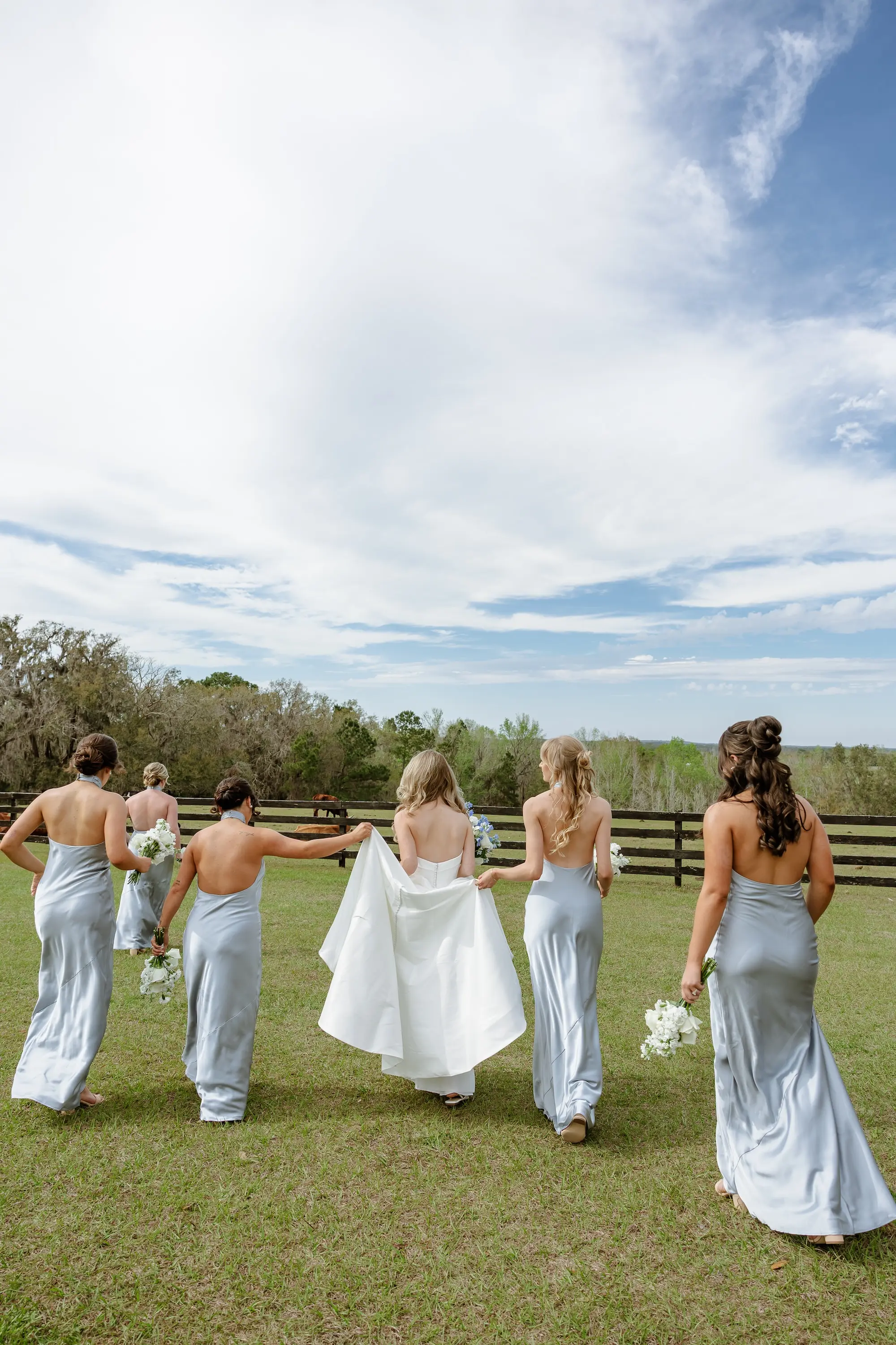 7Classic LIght Blue Florida Wedding Ideas - Classic White and Light Blue Brooksville Wedding | La Hacienda on Snow Hill Bride and Bridesmaids Wedding Portrait | Matching Satin Blue Bridesmaids Dress Inspiration