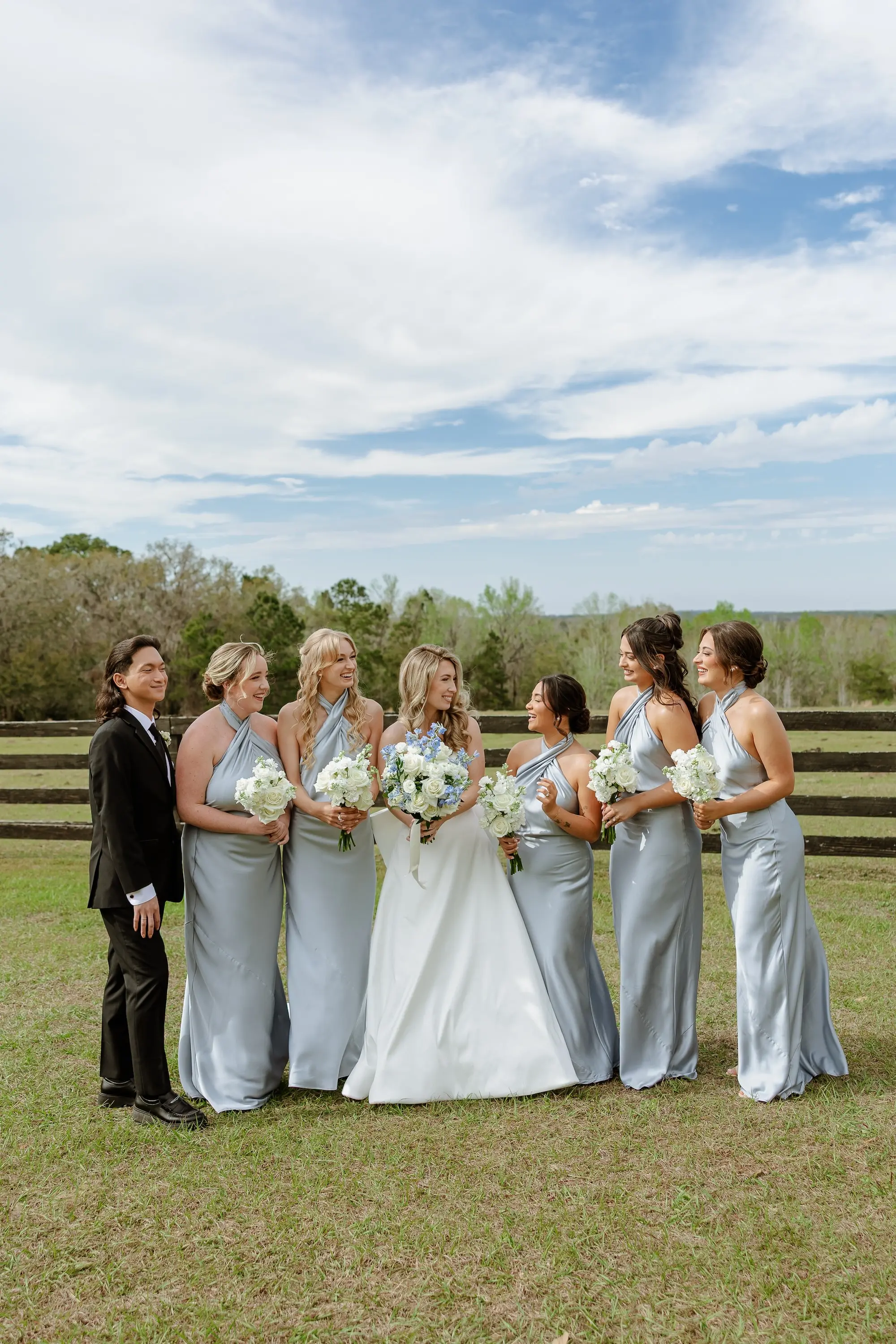 8Classic LIght Blue Florida Wedding Ideas - Classic White and Light Blue Brooksville Wedding | La Hacienda on Snow Hill Bride and Bridesmaids Wedding Portrait | Matching Satin Blue Bridesmaids Dress Inspiration