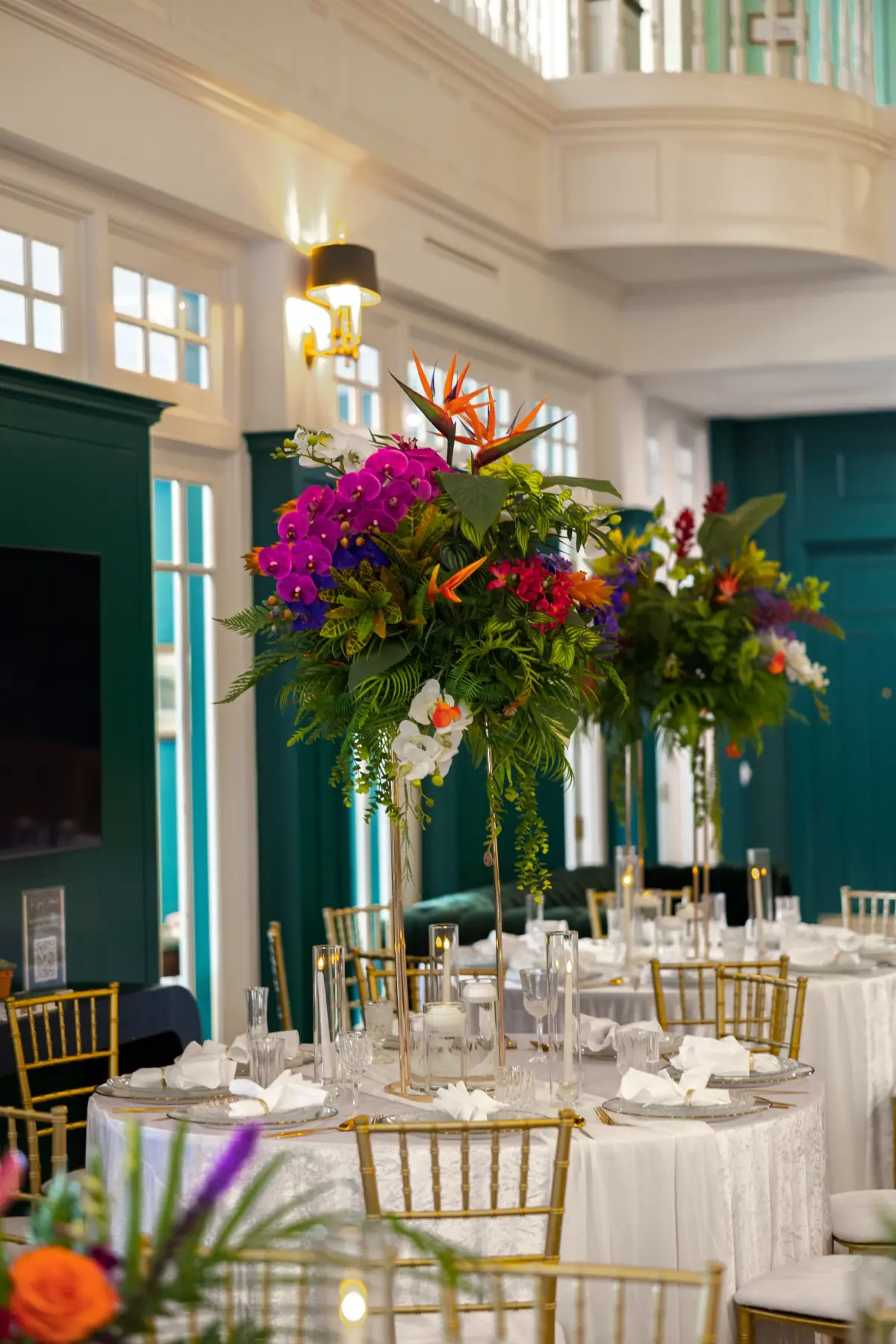 Modern Classic Wedding Ideas | Black and White Checkered Reception Floor Inspiration | White Linens with Gold Chiavari Chairs Ideas | Bright Jewel Toned Coral, Mauves and White Tropical Floral Centerpieces with Deep Green Palms and Greenery Decor Inspiration | Tampa Bay Wedding Venue The Spiral Staircase
