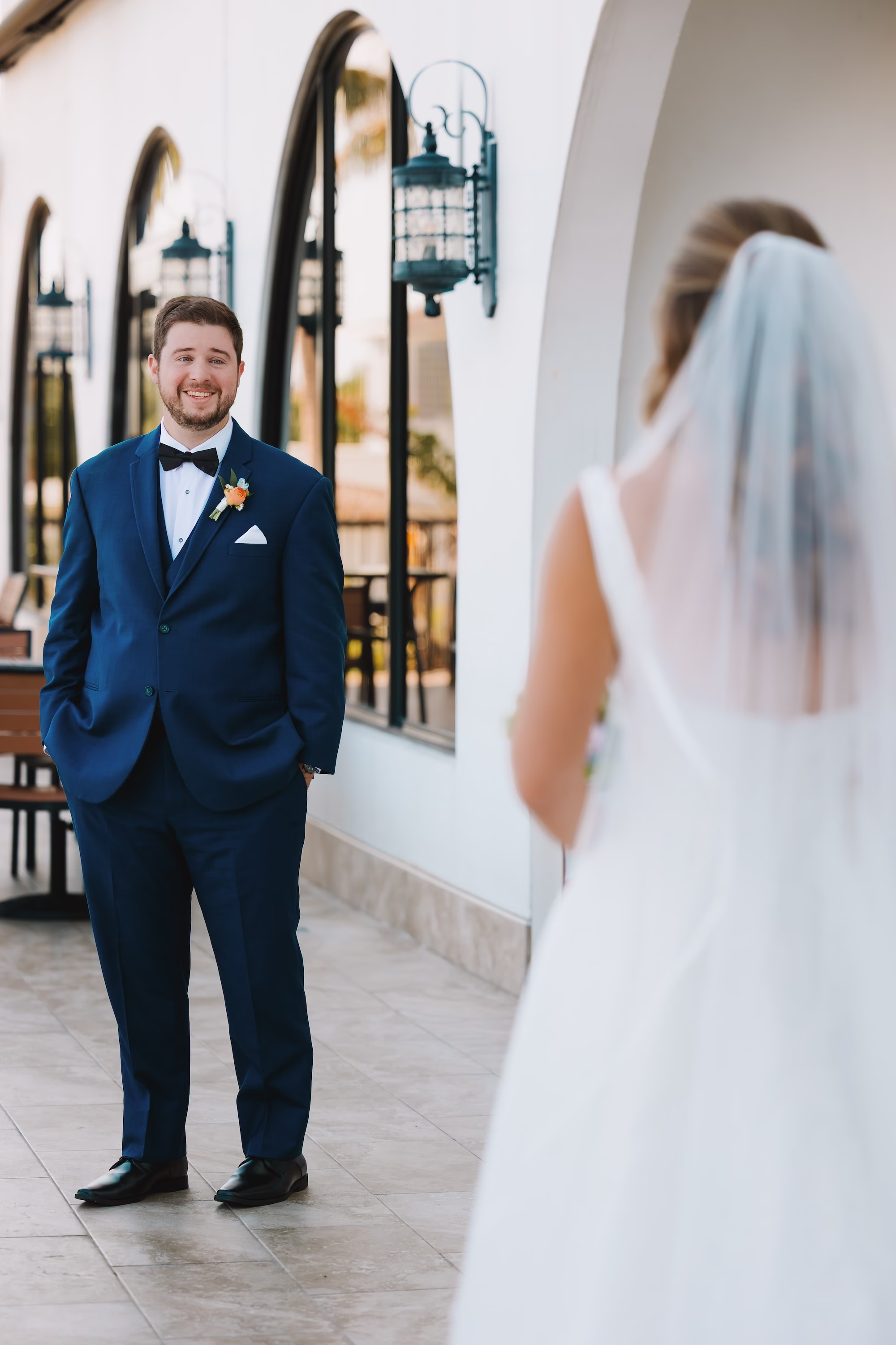 11Coastal Blue and White Rooftop Florida Wedding Ideas - Romantic Blue Coastal St. Pete Beach Wedding | The Hotel Zamora Bride and Groom First Look Wedding Portrait