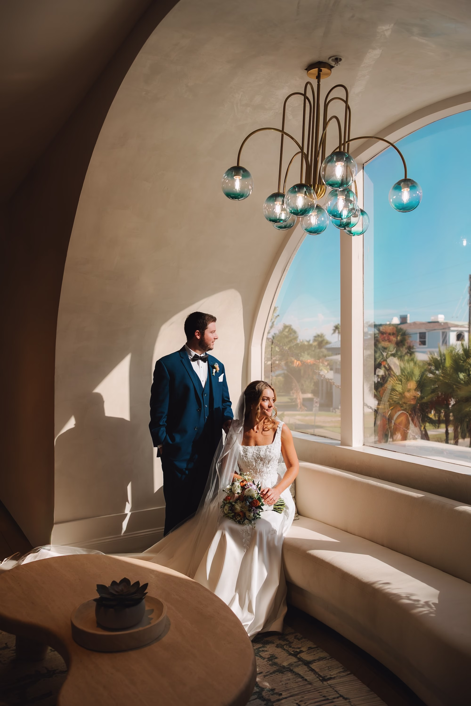 15Coastal Blue and White Rooftop Florida Wedding Ideas St Pete Venue Hotel Zamora - Romantic Blue Coastal St. Pete Beach Wedding | The Hotel Zamora Bride and Groom Wedding Portrait | Classic Half Up Half Down Bridal Hair with Veil Inspiration | Elegant White Magnolia White A-Line Wedding Gown with Square Neckline and Full Skirt Ideas | Sarasota Hair and Makeup Artist Femme Akoi Beauty Studio | St Pete Beach Wedding Venue Hotel Zamora