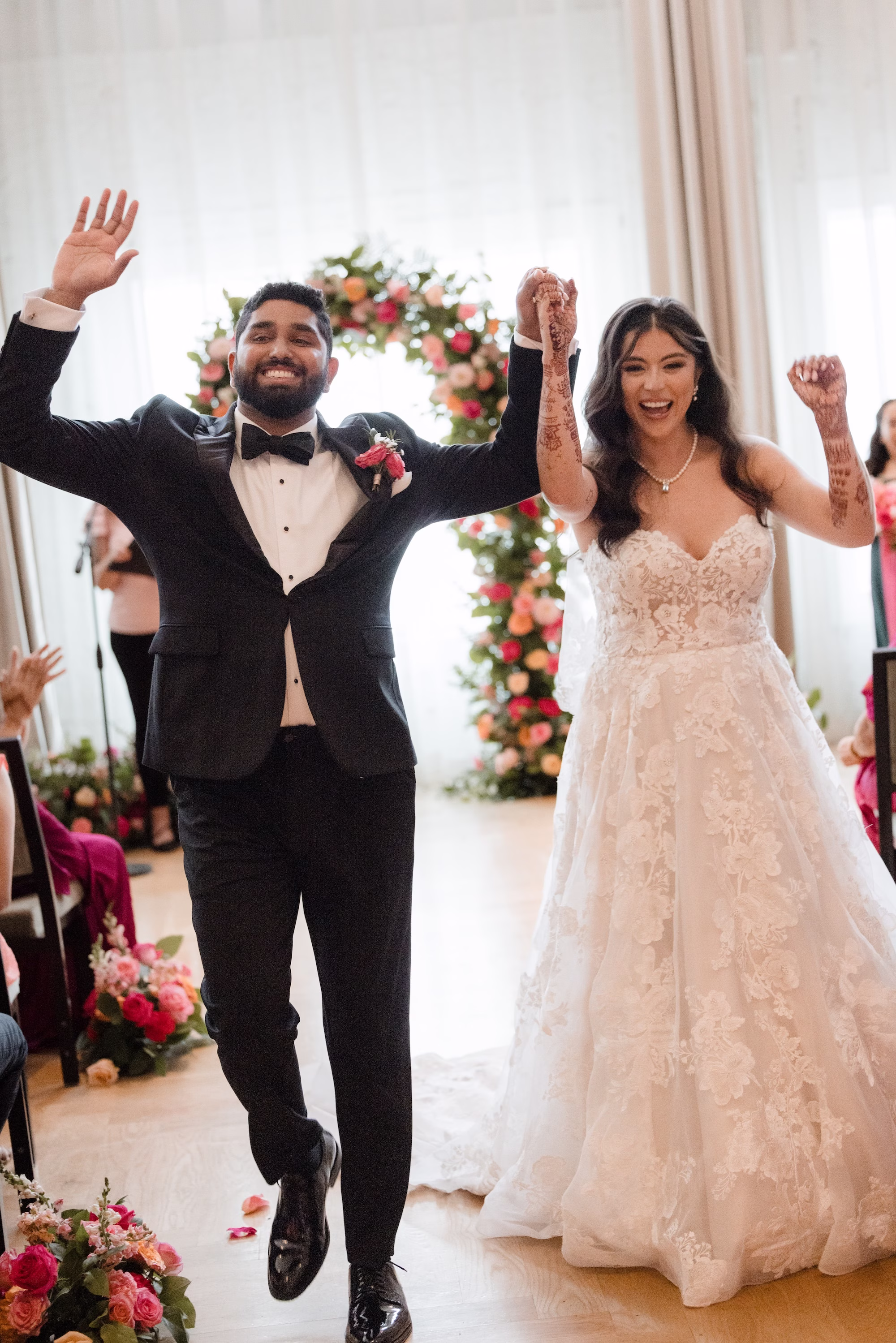 Bride and Groom Wedding Ceremony Just Married Wedding Portrait | Romantic Bright Pink and Green Floral Wedding Ceremony Altar Arch Decor Inspiration | Tampa Historic Venue Hotel Haya | Photographer Evoke Photo and Film
