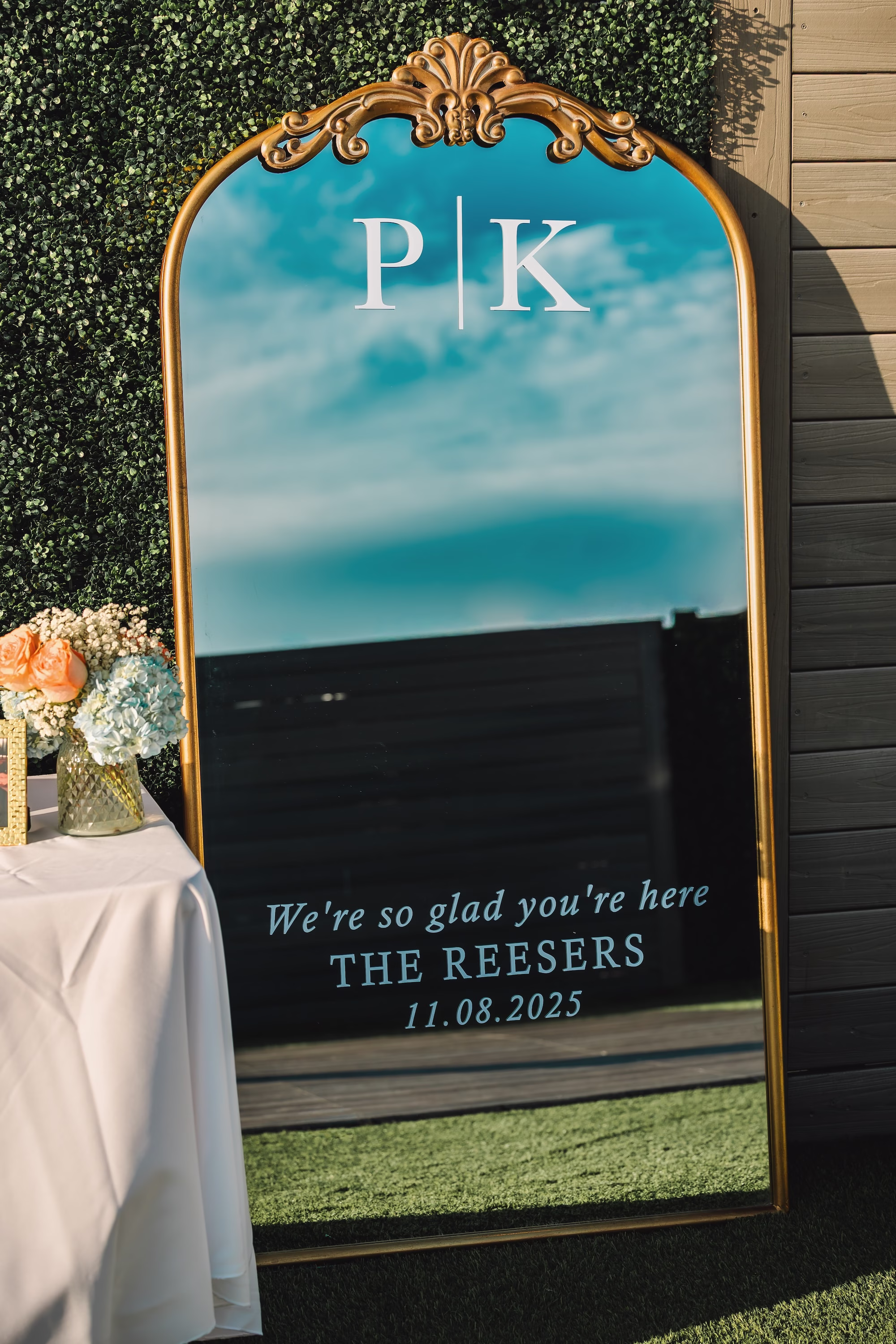 24Coastal Blue and White Rooftop Florida Wedding Ideas - Romantic Blue Coastal St. Pete Beach Wedding | The Hotel Zamora Vintage Gold Mirror Wedding Reception Welcome Sign Decor Inspiration | Coastal Coral, Blue and White Flower Arrangement Wedding Reception Decor Inspiration