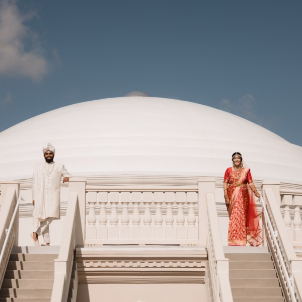 Bride and Groom Wedding Portrait | Red and Gold Bridal Saree Inspiration | White Groom Sherwani, Churidar and Sehra Ideas | Traditional Indian Bride and Groom Attire Inspiration | Tampa Bay Event Venue Whitehurst Gallery | Photographer Evoke Photo and Film