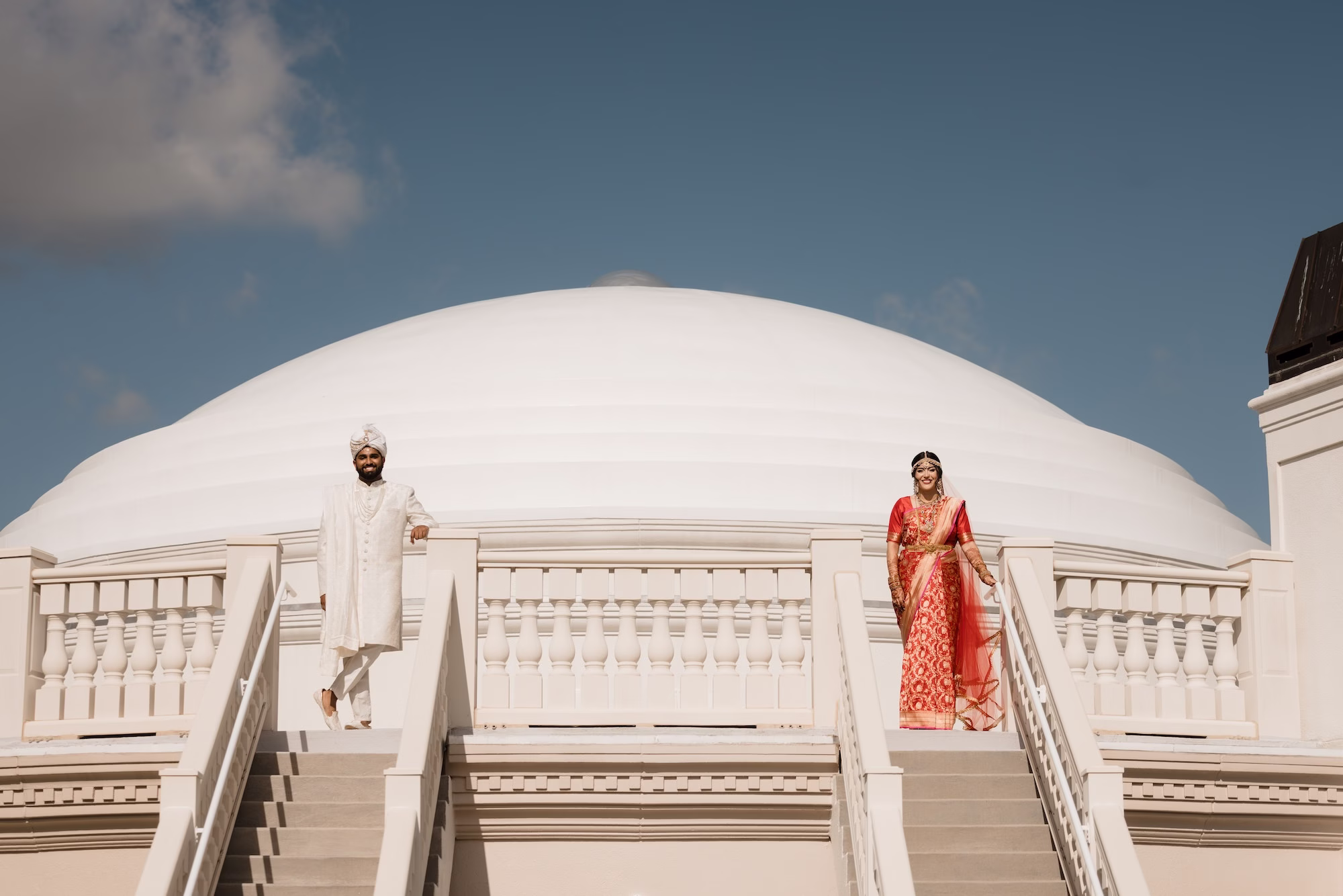 Bride and Groom Wedding Portrait | Red and Gold Bridal Saree Inspiration | White Groom Sherwani, Churidar and Sehra Ideas | Traditional Indian Bride and Groom Attire Inspiration | Tampa Bay Event Venue Whitehurst Gallery | Photographer Evoke Photo and Film