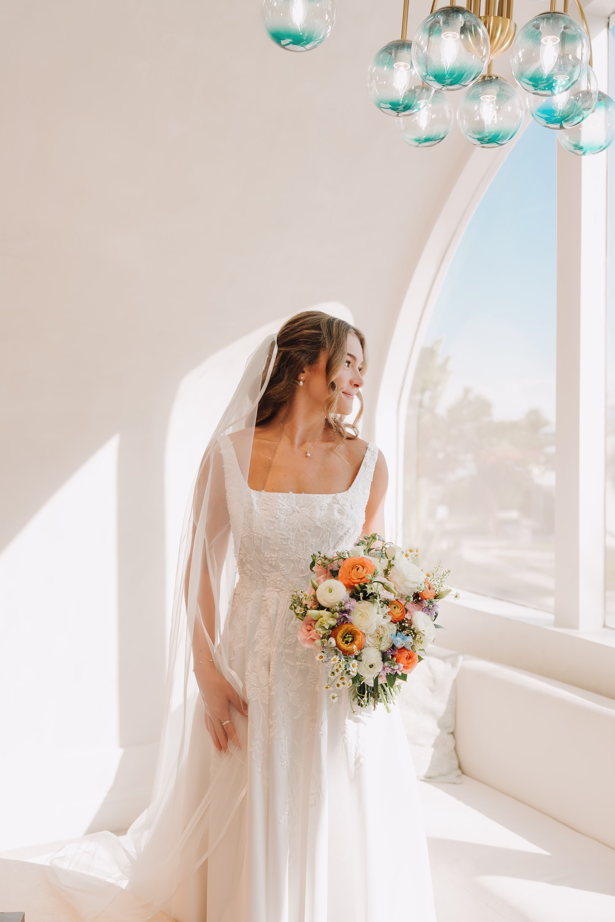 8Coastal Blue and White Rooftop Florida Wedding Ideas - Romantic Blue Coastal St. Pete Beach Wedding | The Hotel Zamora Bride Wedding Portrait | Elegant White Magnolia White A-Line Wedding Gown with Square Neckline and Full Skirt Ideas | Colorful Romantic Bridal Bouquet Inspiration | Classic Traditional Chiffon Veil Ideas | Timeless Half Up Half Down Bridal Hair with Veil Inspiration | Sarasota Hair and Makeup Artist Femme Akoi Beauty Studio