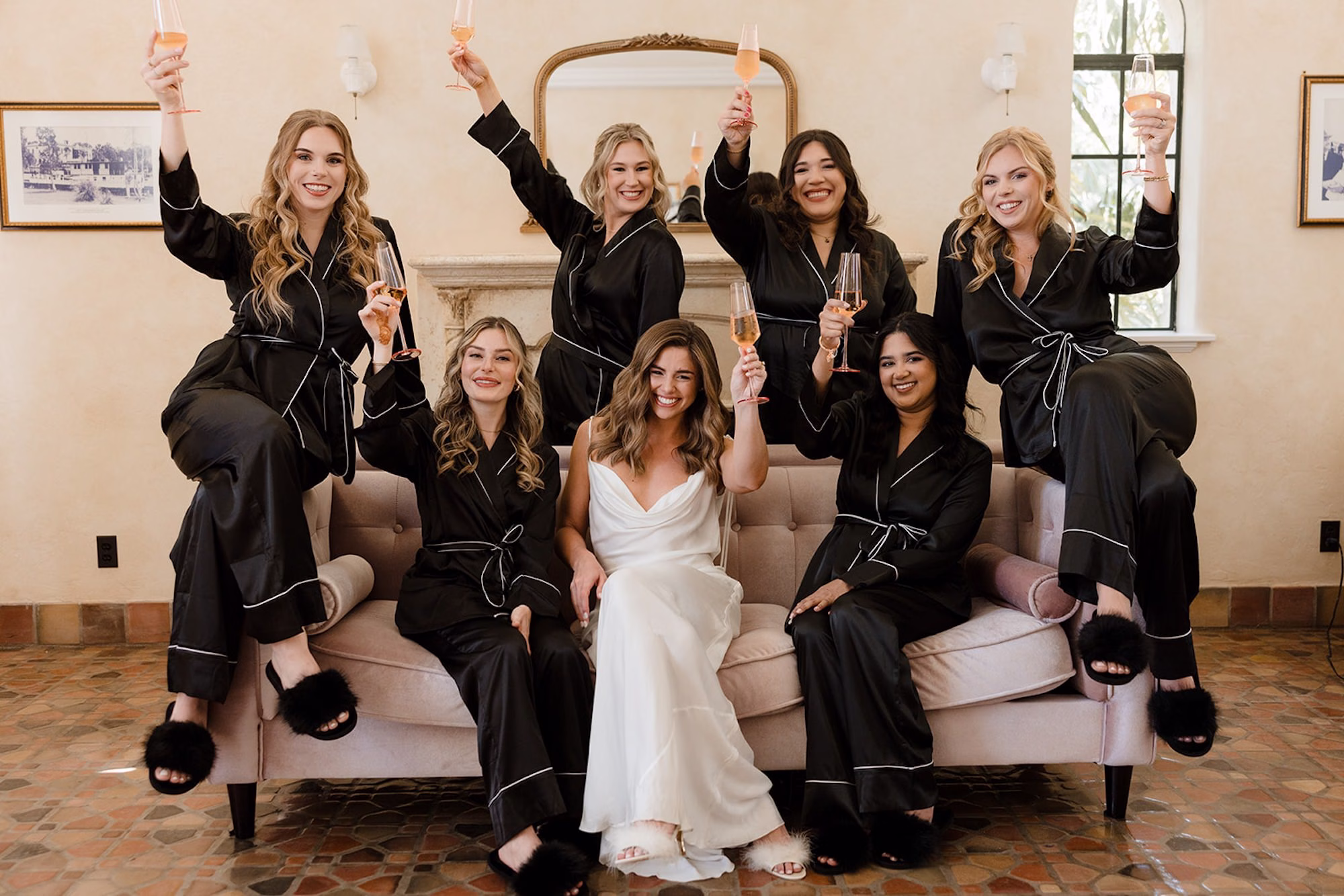 33Romantic Pink and Gold Waterfront Florida Wedding - Vibrant Pink and Gold Multicultural Sarasota Wedding | Powel Crosley Estate Bride and Bridesmaids Getting Ready Wedding Portrait in Matching Black and White Pajama Robe Sets | Tampa Bay Photographer Evoke Photo and Film