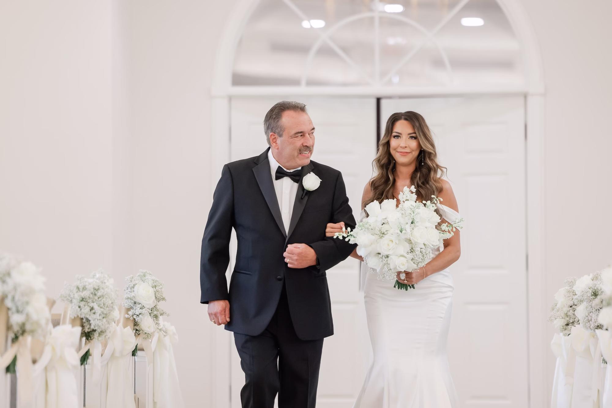 Father and Bride Walking Down Wedding Aisle