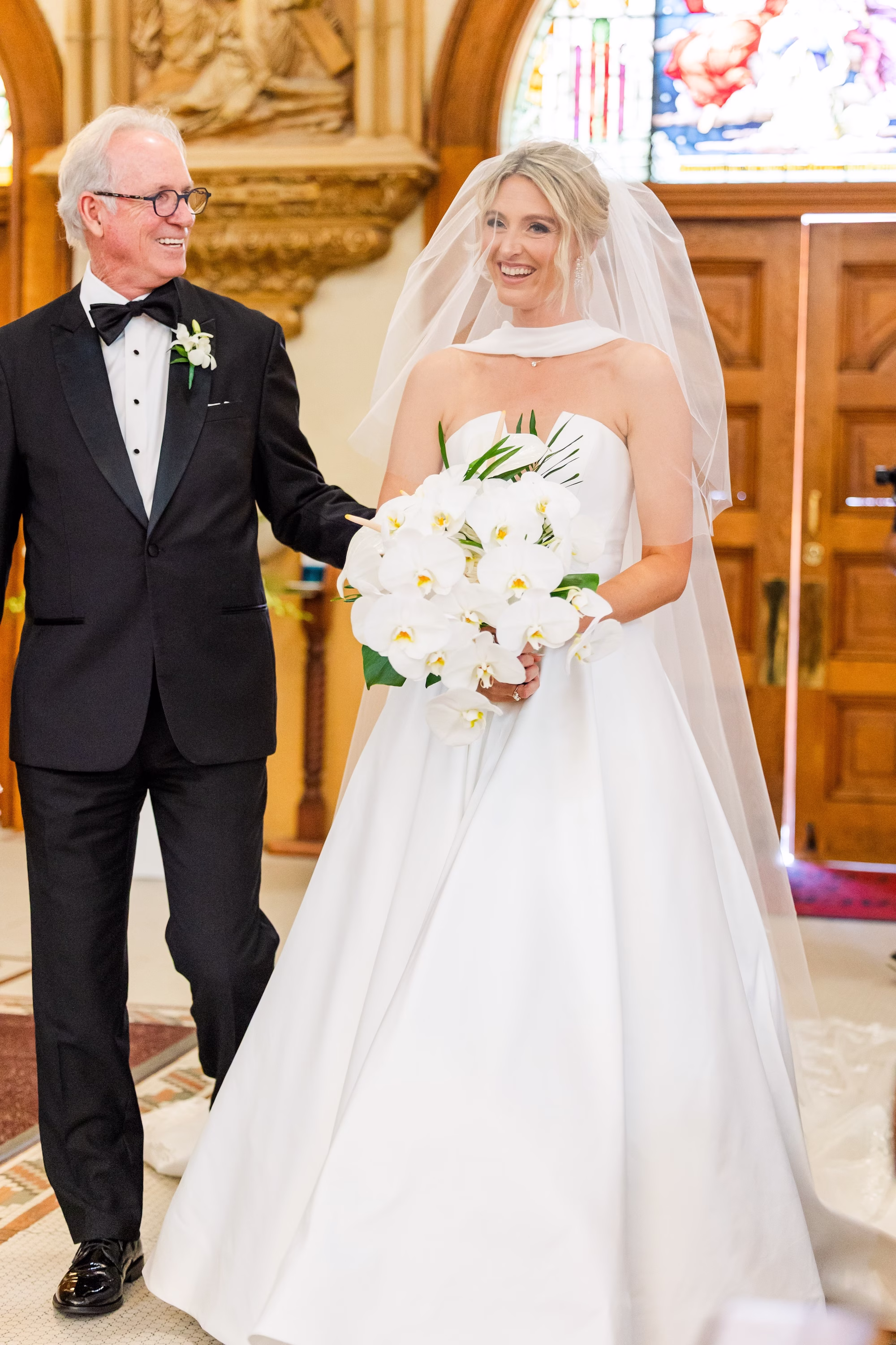 Bride and Father Walking Down Wedding Aisle