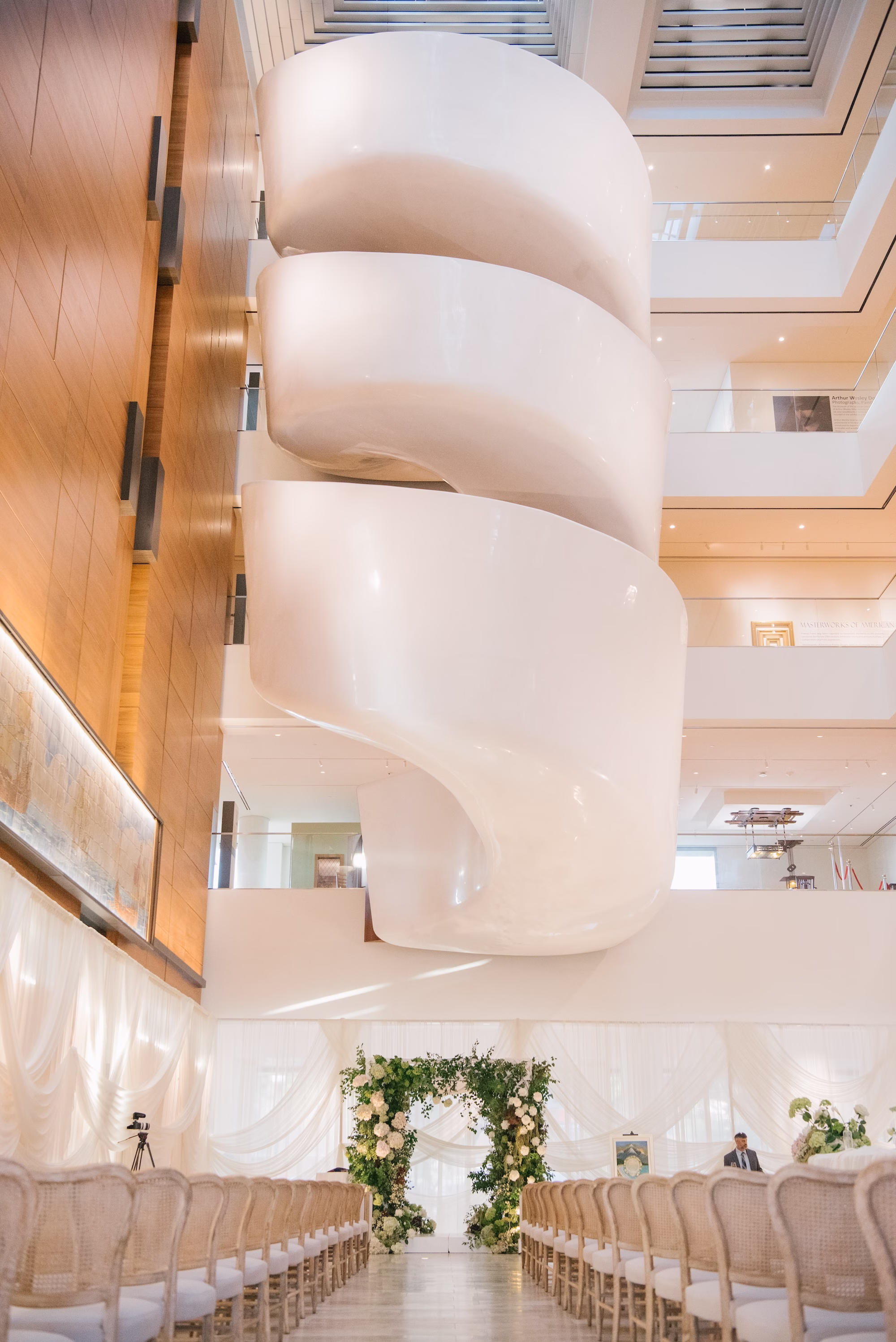 Staircase of Wedding Event Venue St Pete Event Venue Museum of the American Arts and Crafts Movement | Traditional Jewish Wedding Ceremony Chuppah of Lush Green Foliage and White Hydrangeas and Roses Ideas | St Pete Planner Stelloccasions Weddings and Events