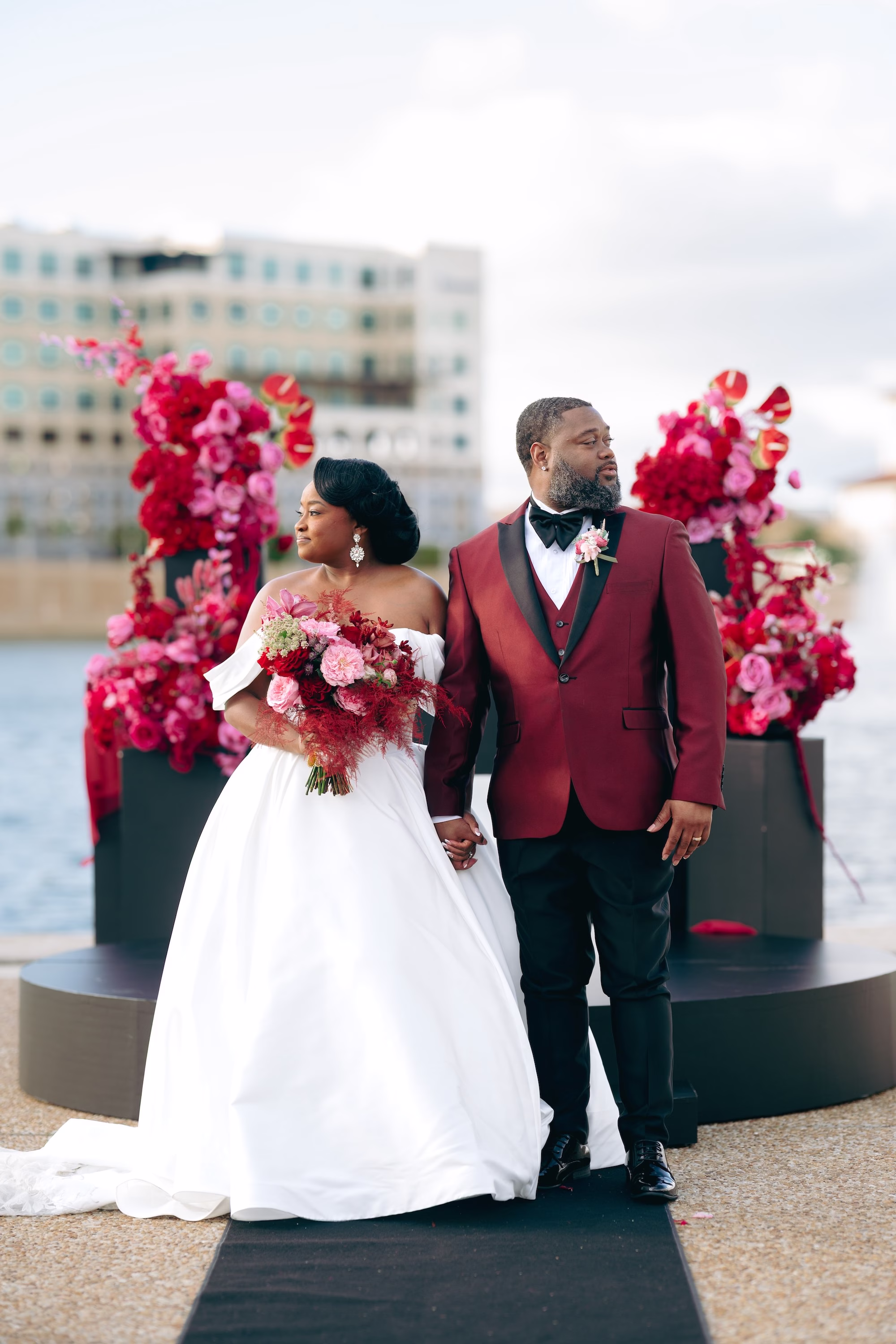 16Bold Pink Red and Burgundy Wedding Ideas - Glamorous, Burgundy Lakeland Wedding | Lake Mirror Amphitheater Bride and Groom Waterfront Wedding Ceremony Portrait | Romantic Red, Pink, Green, Burgundy Florals Bridal Bouquet Ideas
