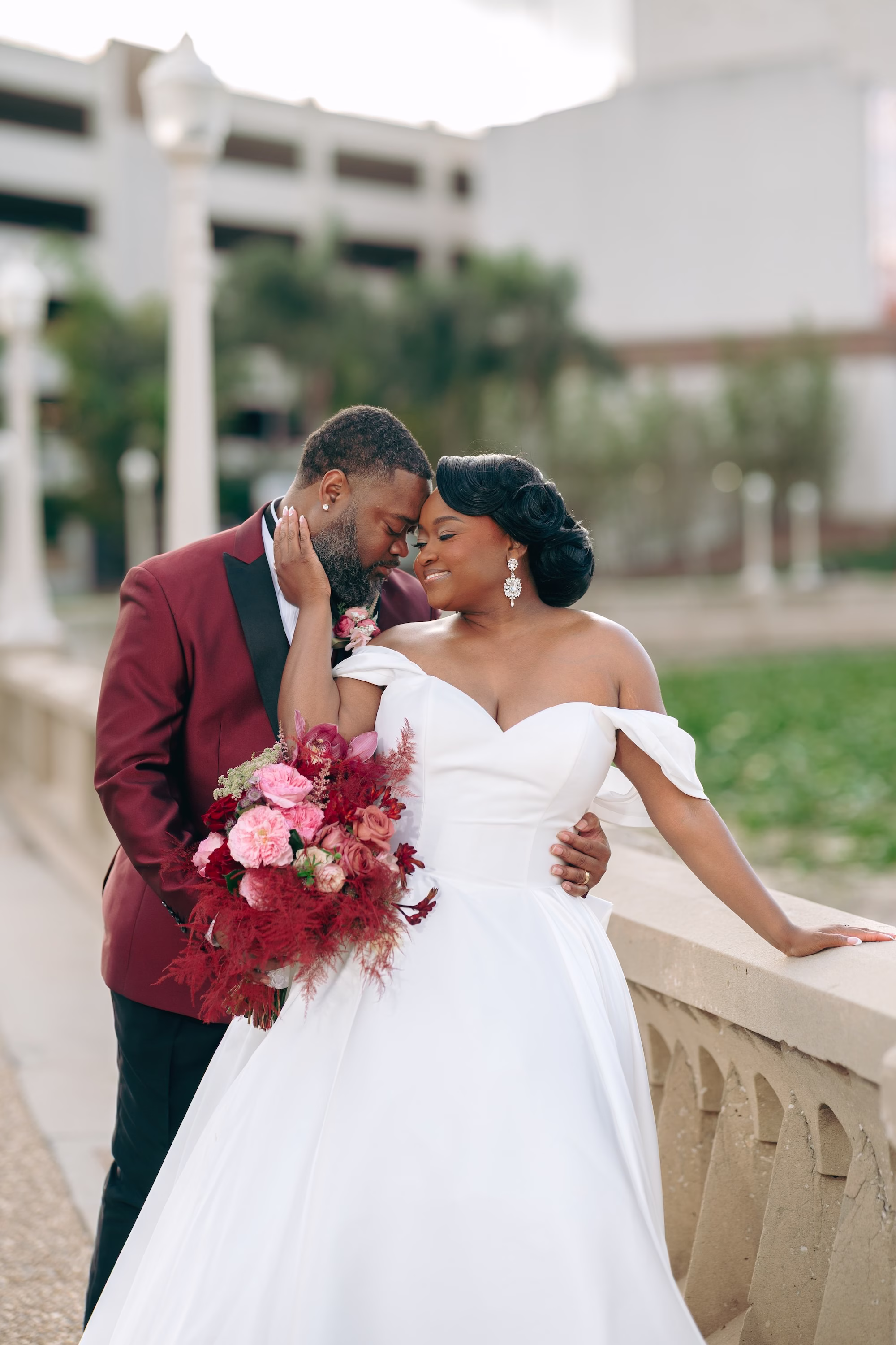 20Bold Pink Red and Burgundy Wedding Ideas - Glamorous, Burgundy Lakeland Wedding | Lake Mirror Amphitheater Bride and Groom Wedding Portrait | Vibrant Burgundy and Pink Bridal Bouquet Inspiration | Groom Burgundy Tuxedo Jacket Ideas