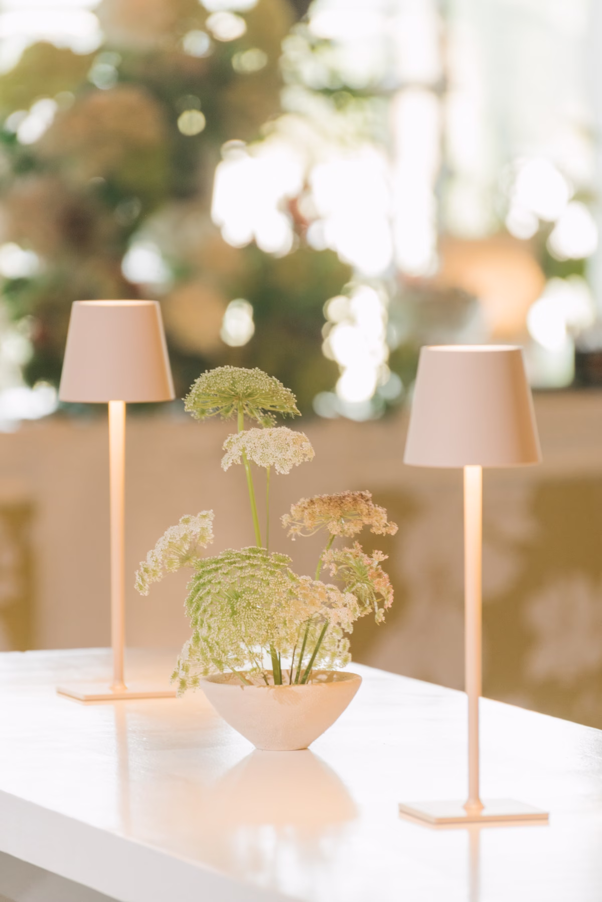 Elegant Minimalistic Green and White Wedding Reception Decor Inspiration | Slim Cordless Soft Cream Table Lamps Tablescape Decor Ideas | Delicate White and Light Green Wildflower Centerpiece Queen Anne's Lace Floral Arrangement Inspiration | St Pete Planner Stelloccasions Weddings and Events