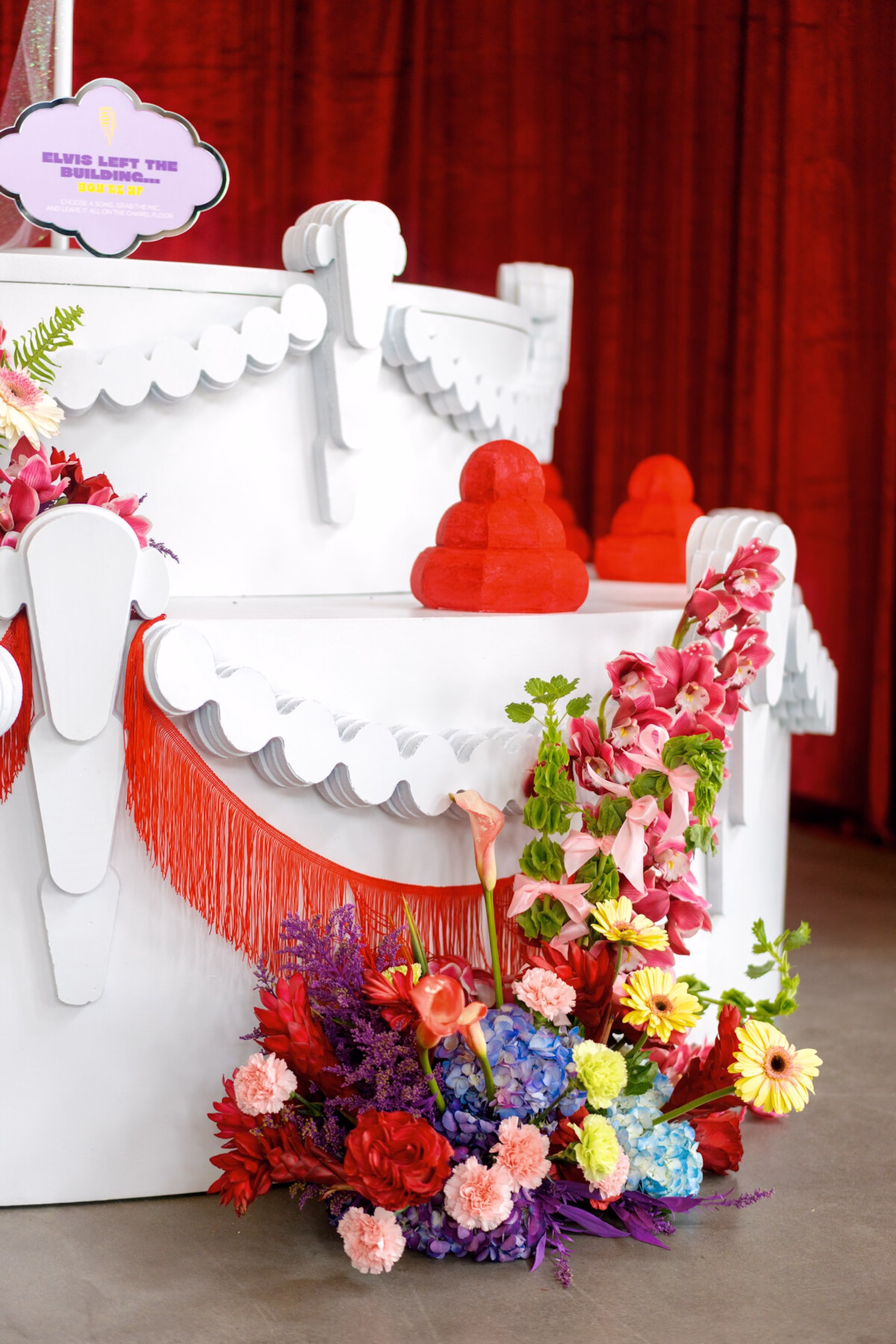 34Whimsical Red Las Vegas Pink Pony Club Inspired Wedding - Bold and Vibrant Same-Sex Ybor City Wedding Inspiration | Hotel Haya Whimsical Red Las Vegas Pink Pony Club Inspired Wedding Ceremony Decor Ideas