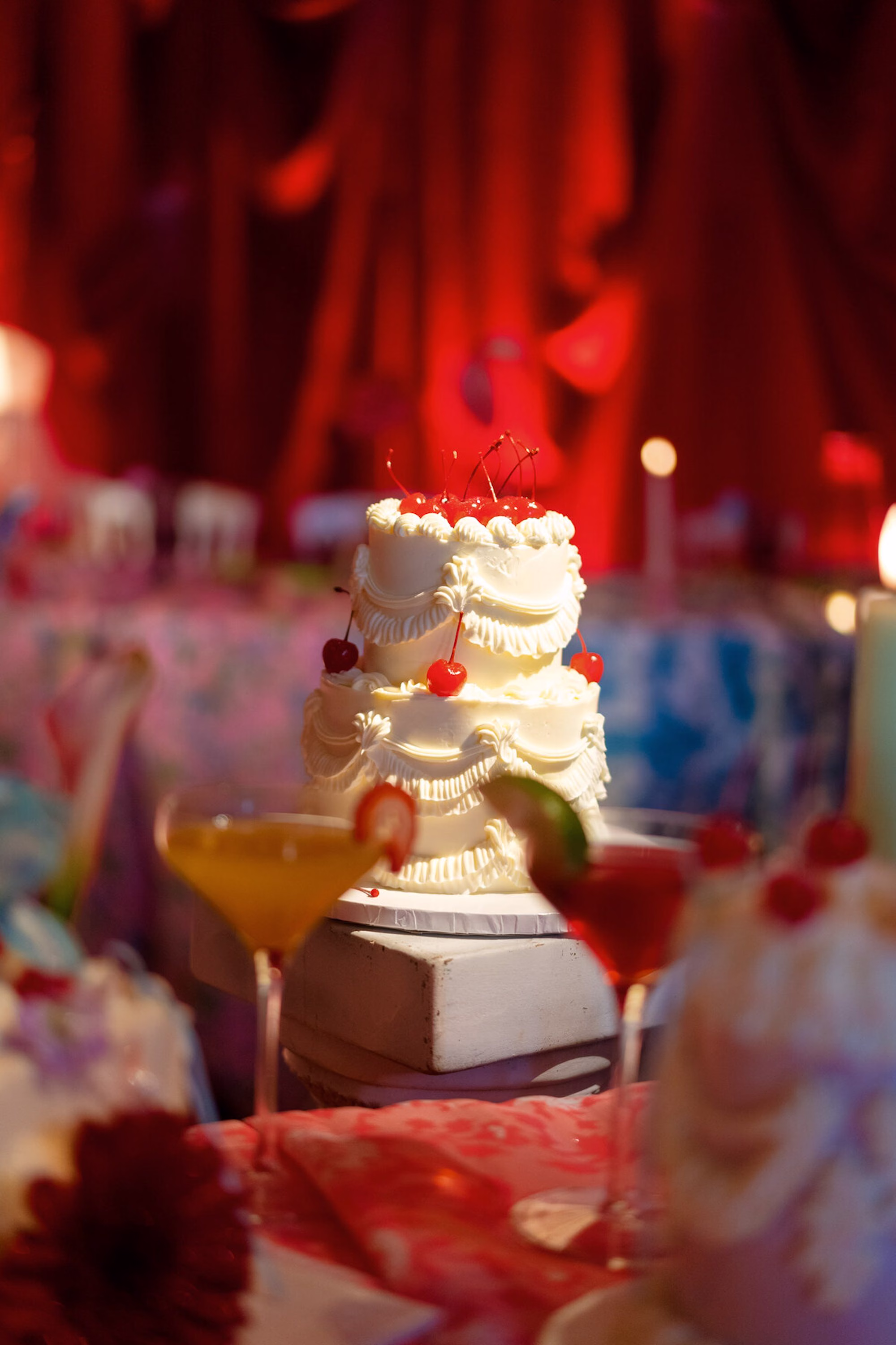 65Whimsical Red Las Vegas Pink Pony Club Inspired Wedding - Bold and Vibrant Same-Sex Ybor City Wedding Inspiration | Hotel Haya Two-Tiered Heart Wedding Cake with Cherries