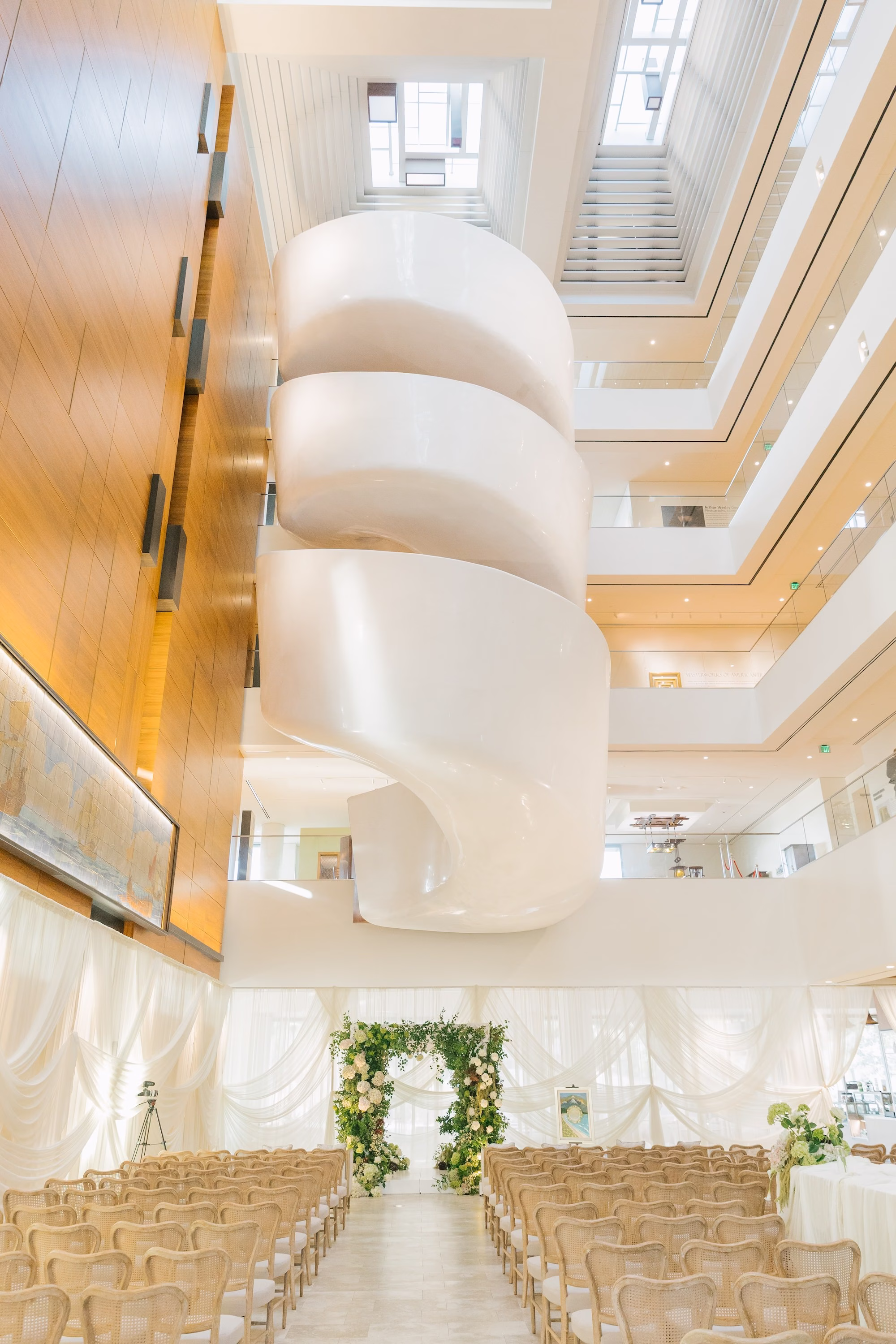 Staircase of Wedding Event Venue St Pete Event Venue Museum of the American Arts and Crafts Movement | Traditional Jewish Wedding Ceremony Chuppah of Lush Green Foliage and White Hydrangeas and Roses Ideas | St Pete Planner Stelloccasions Weddings and Events
