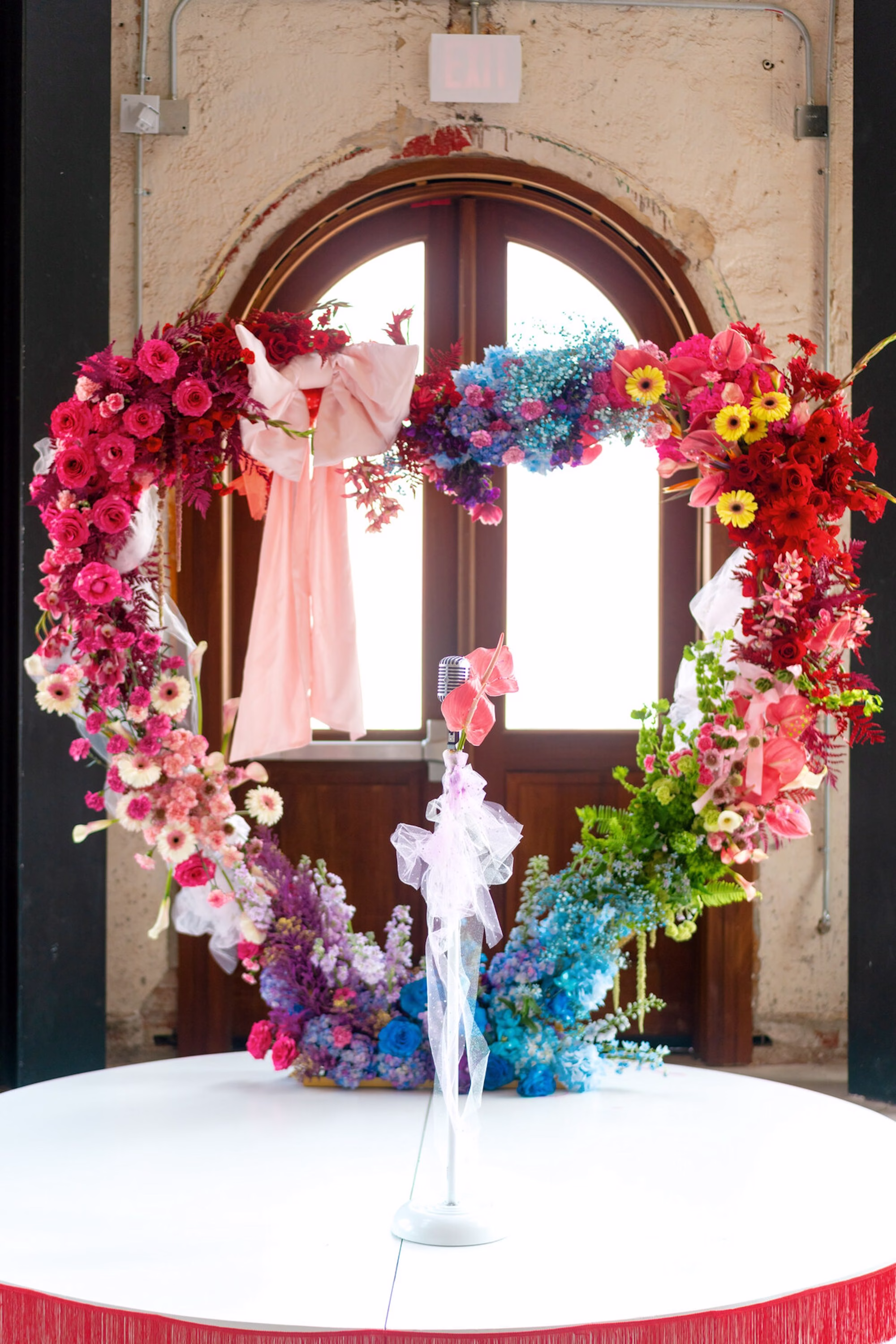 8Whimsical Red Las Vegas Pink Pony Club Inspired Wedding - Bold and Vibrant Same-Sex Ybor City Wedding Inspiration | Hotel Haya Whimsical Red Las Vegas Pink Pony Club Inspired Wedding Ceremony Altar Stage Decor Ideas