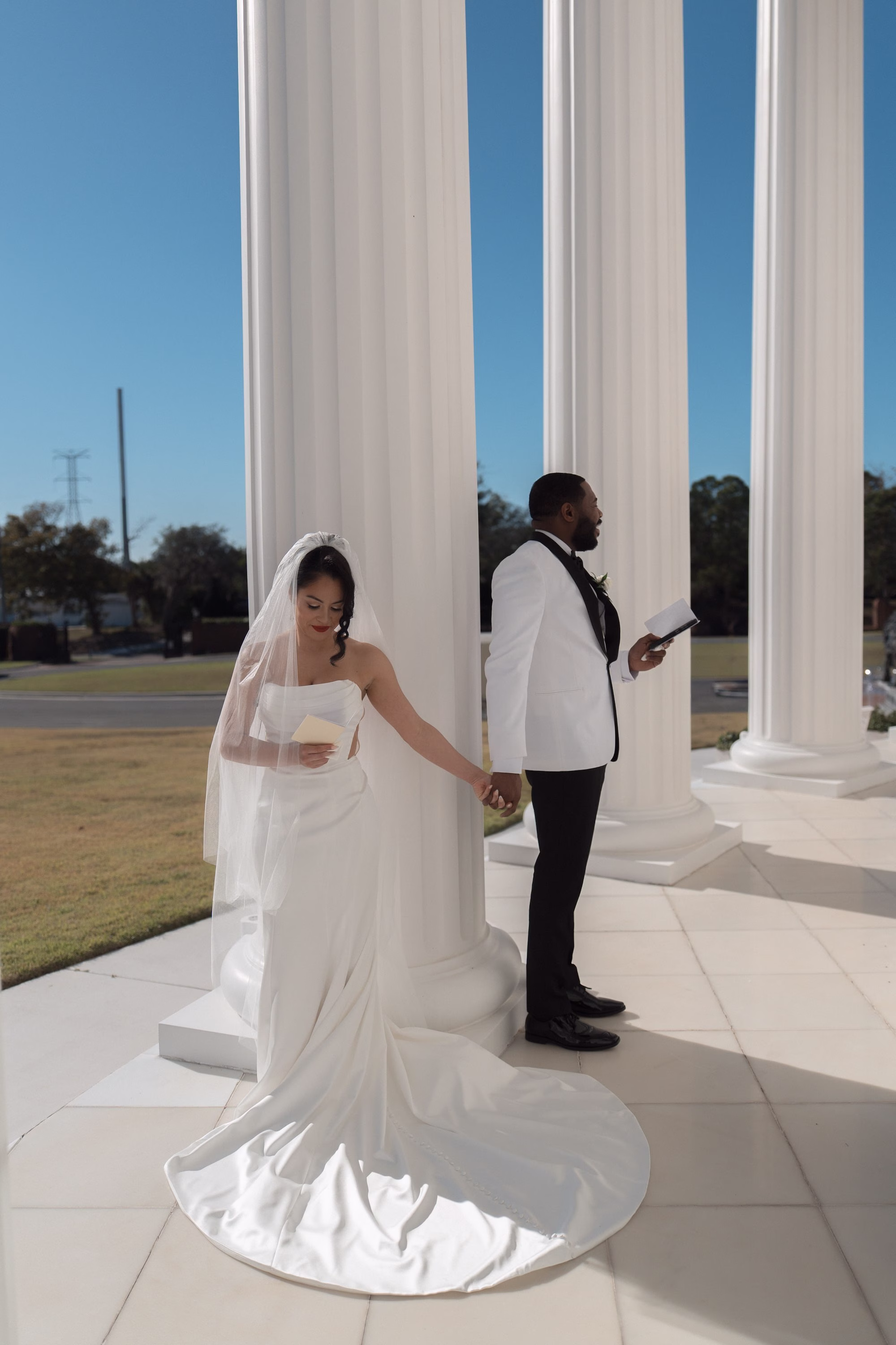 10Timeless Black and Wedding New Years Eve Wedding Ideas - Timeless Black and White Tarpon Springs Wedding | Whitehurst Gallery Bride and Groom Reading Letters First Look Wedding Portrait | Tampa Bay Photographer Amber Yonker Photography