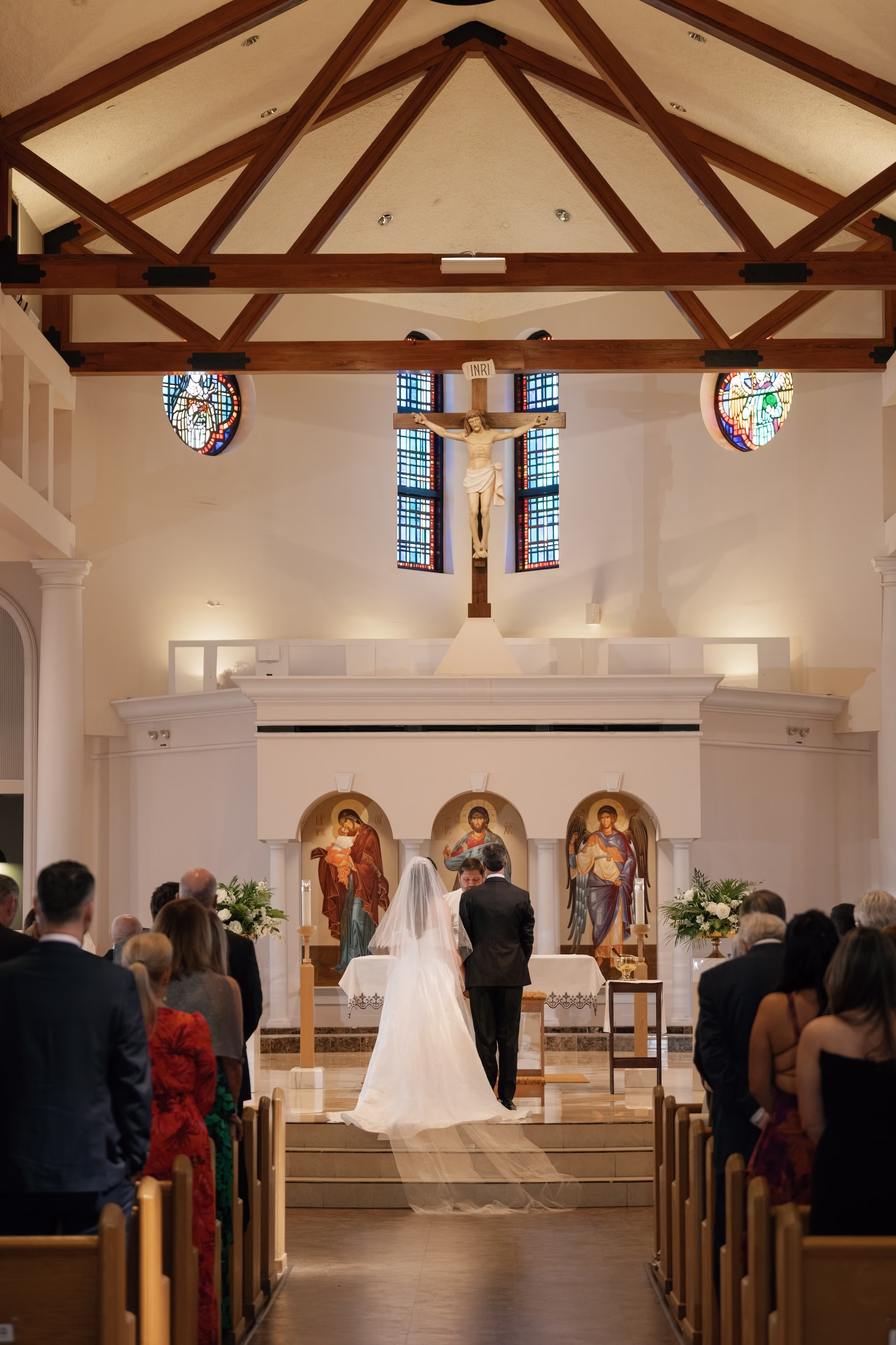 11Tropical Green Florida Wedding Ideas Ceremony Venue St. Raphael Catholic Church - Tropical, Green Downtown St. Pete Wedding | Poynter Institute Bride and Groom Vow Exchange Traditional Catholic Church Wedding Ceremony Portrait | St Pete Traditional Wedding Ceremony Venue St. Raphael's Catholic Church | Tampa Bay Photographer Dewitt For Love
