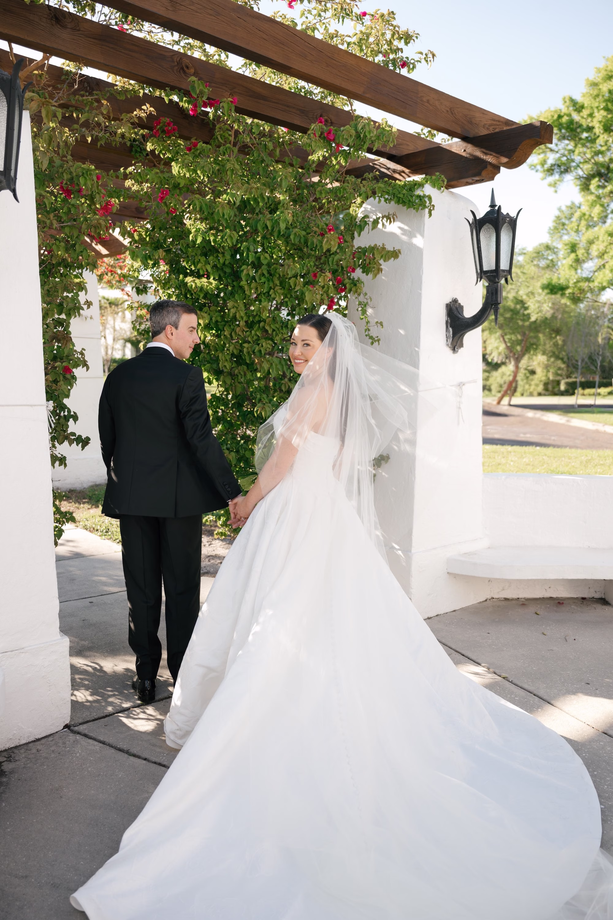 21Tropical Green Florida Wedding Ideas - Tropical, Green Downtown St. Pete Wedding | Poynter Institute Bride and Groom Outdoor Spring Wedding Portrait | Slicked Back Wedding Bridal Hair with Veil Inspiration | Florida Hair and Makeup Adore Bridal | Tampa Bay Photographer Dewitt For Love