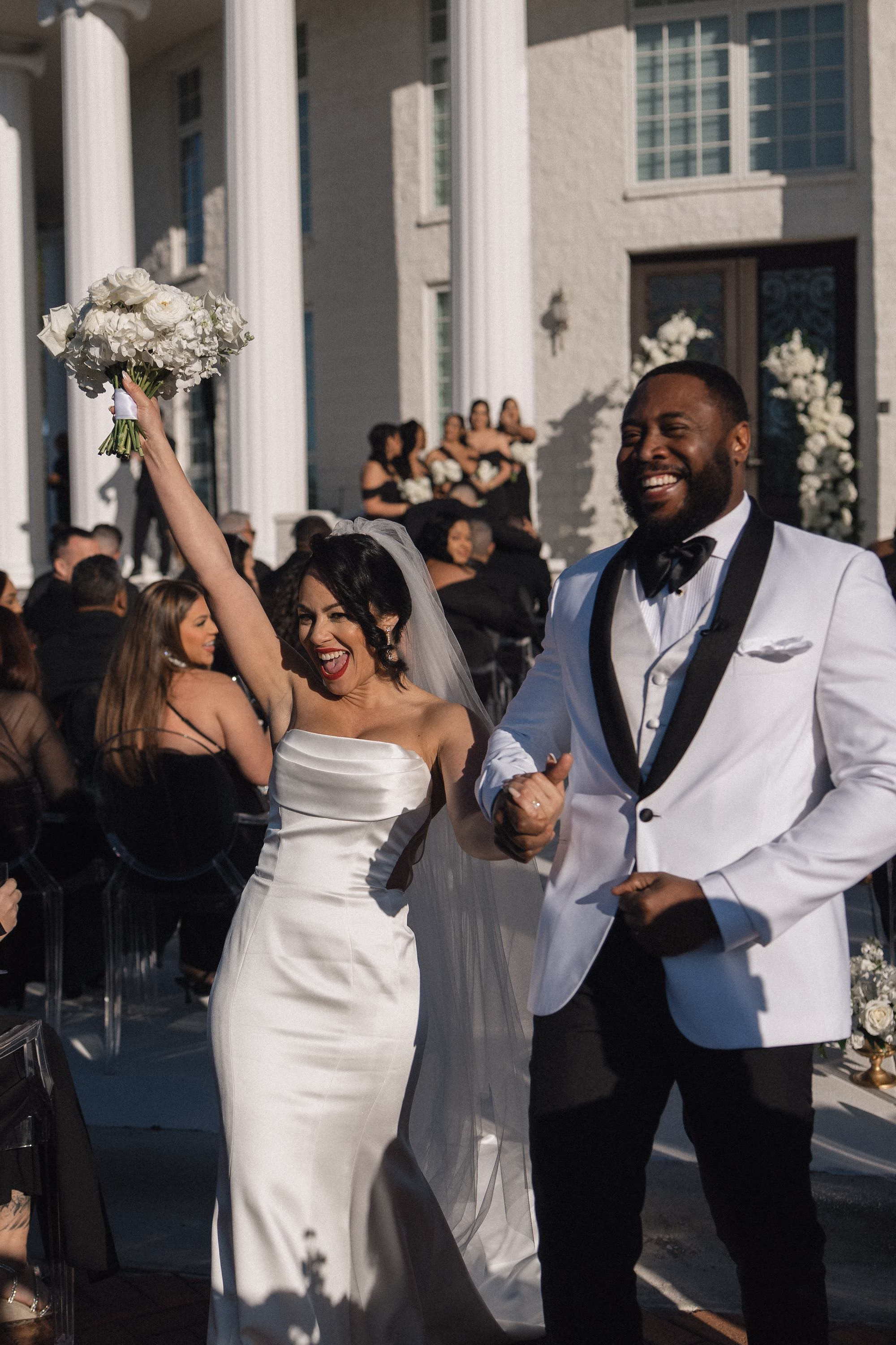 24Timeless Black and Wedding New Years Eve Wedding Ideas - Timeless Black and White Tarpon Springs Wedding | Whitehurst Gallery Bride and Groom Just Married Wedding Ceremony Aisle Wedding Portrait | Black and White New Years Eve Wedding Ceremony Decor Inspiration | Monochromatic White Roses Bridal Bouquet Ideas | Tampa Bay Photographer Amber Yonker Photography