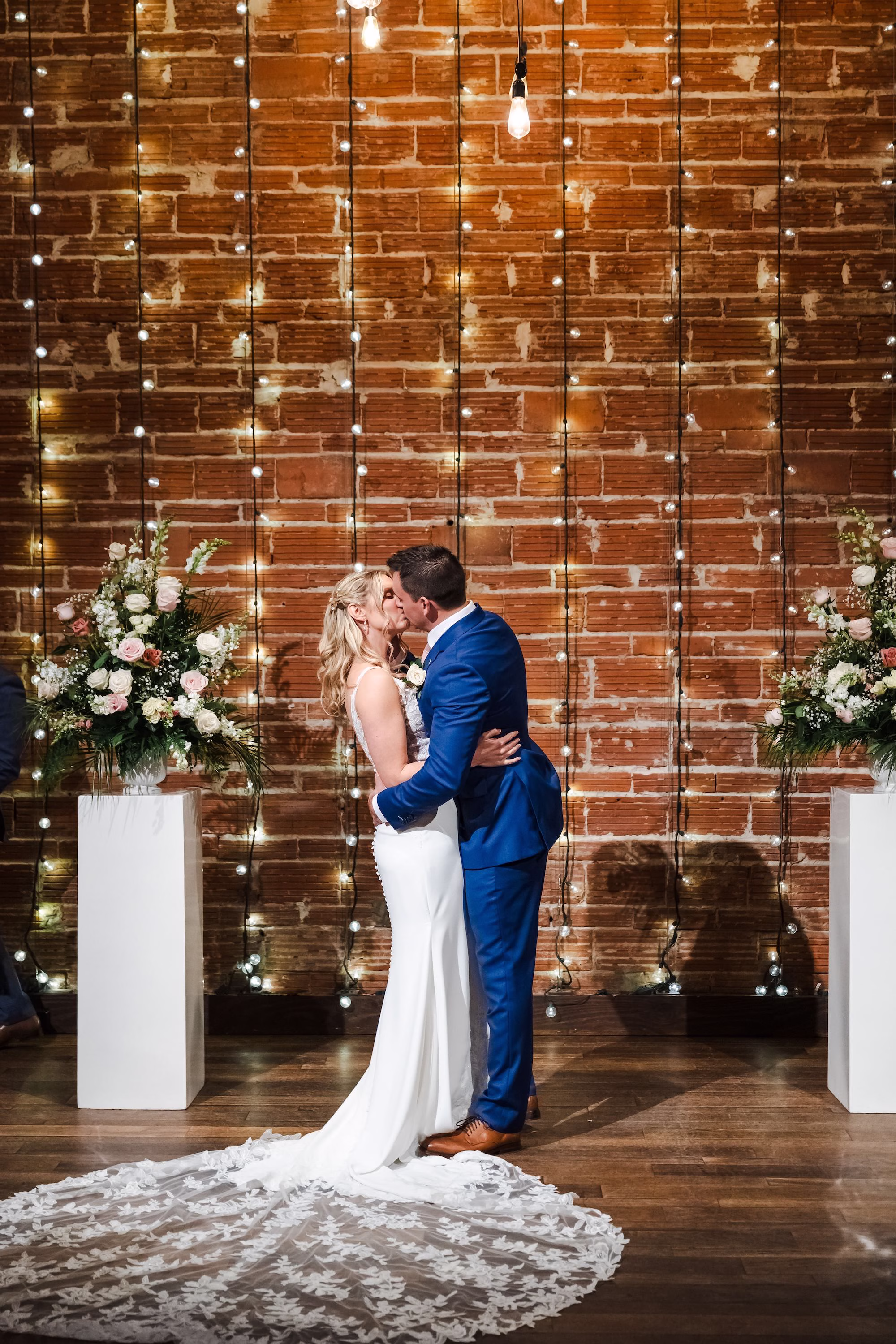 Bride and Groom First Kiss Wedding Portrait | St Pete Photographer Videographer Iyrus Weddings